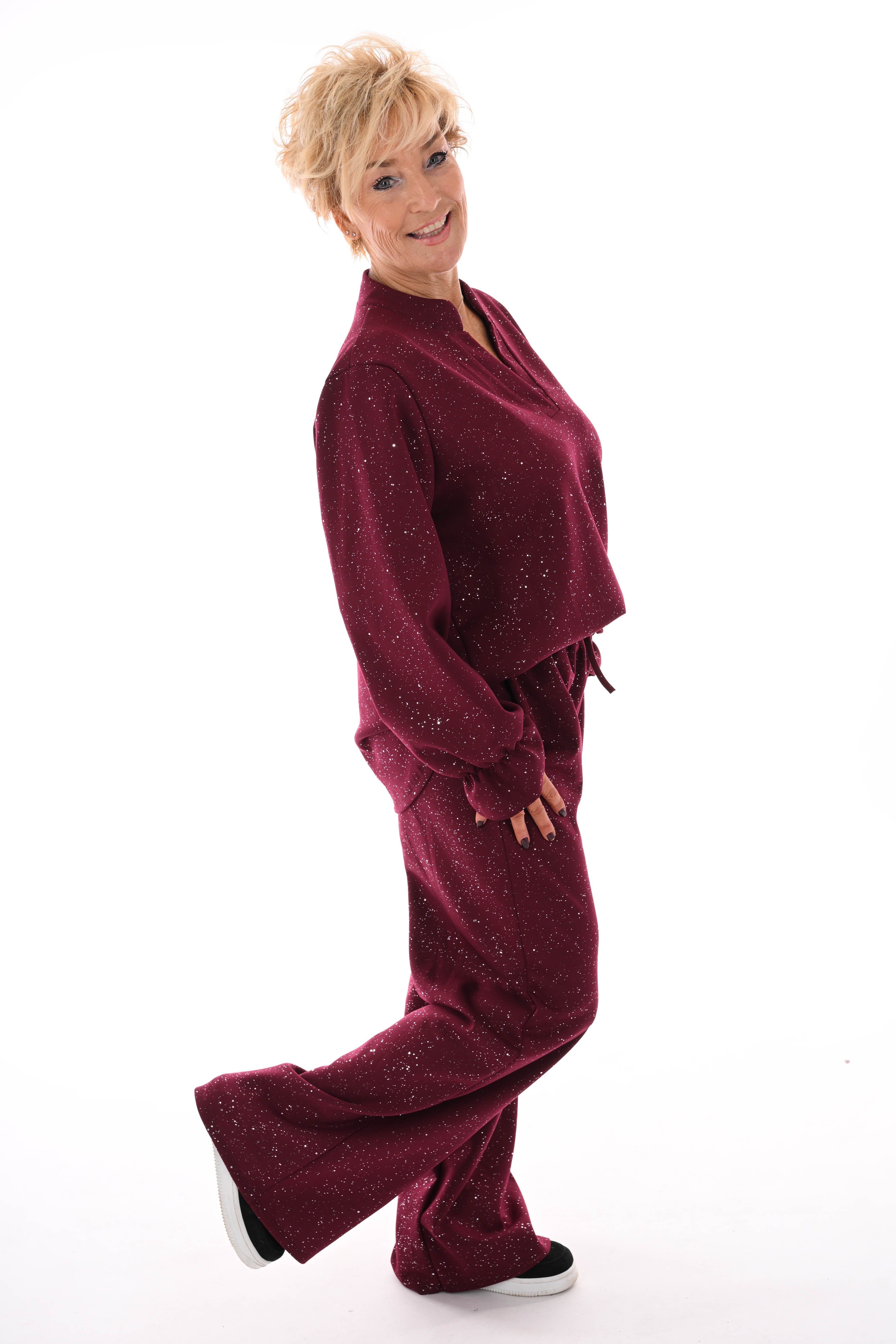 Tweedelig pak glitter flakes roezelmouwen bordeaux