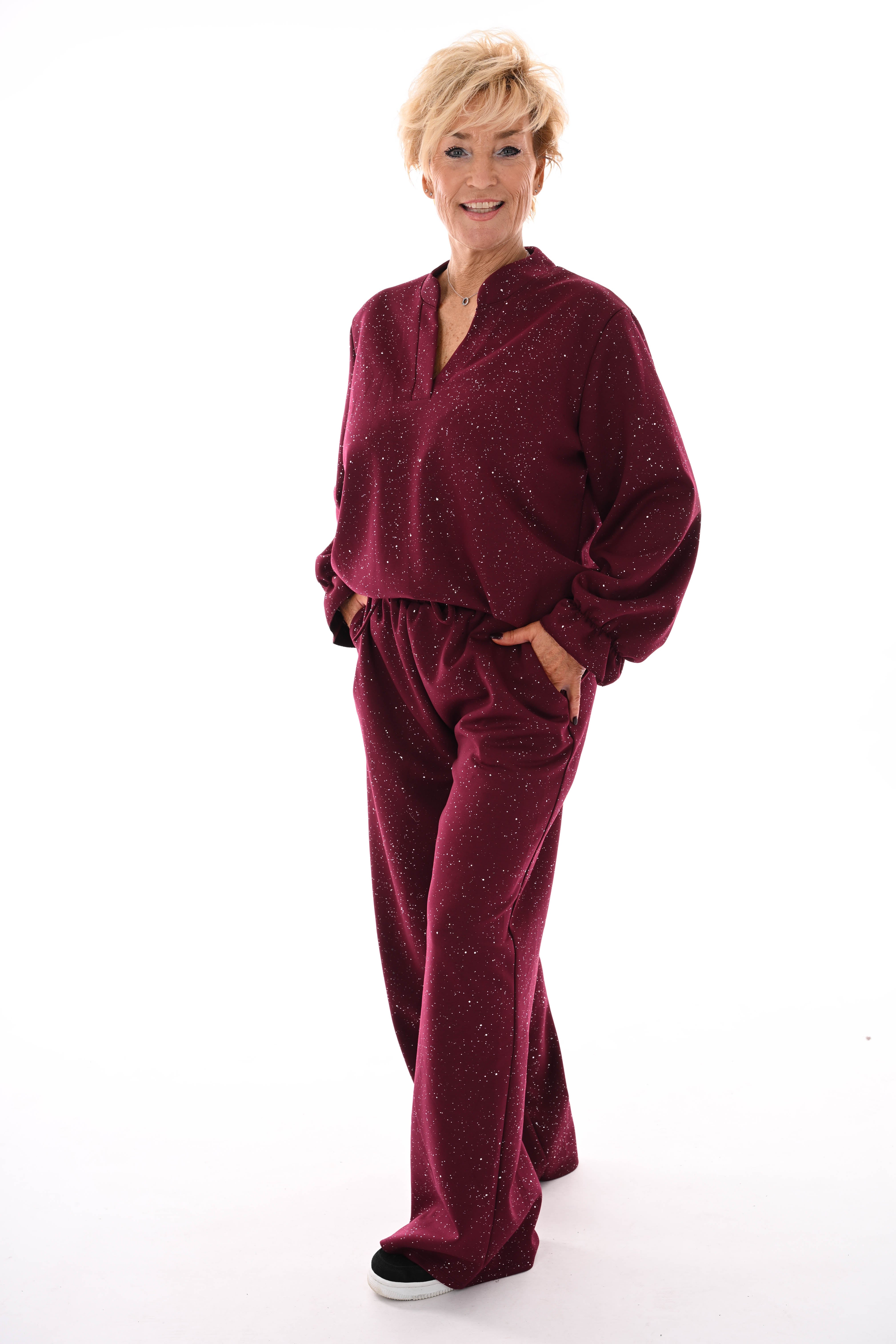 Tweedelig pak glitter flakes roezelmouwen bordeaux