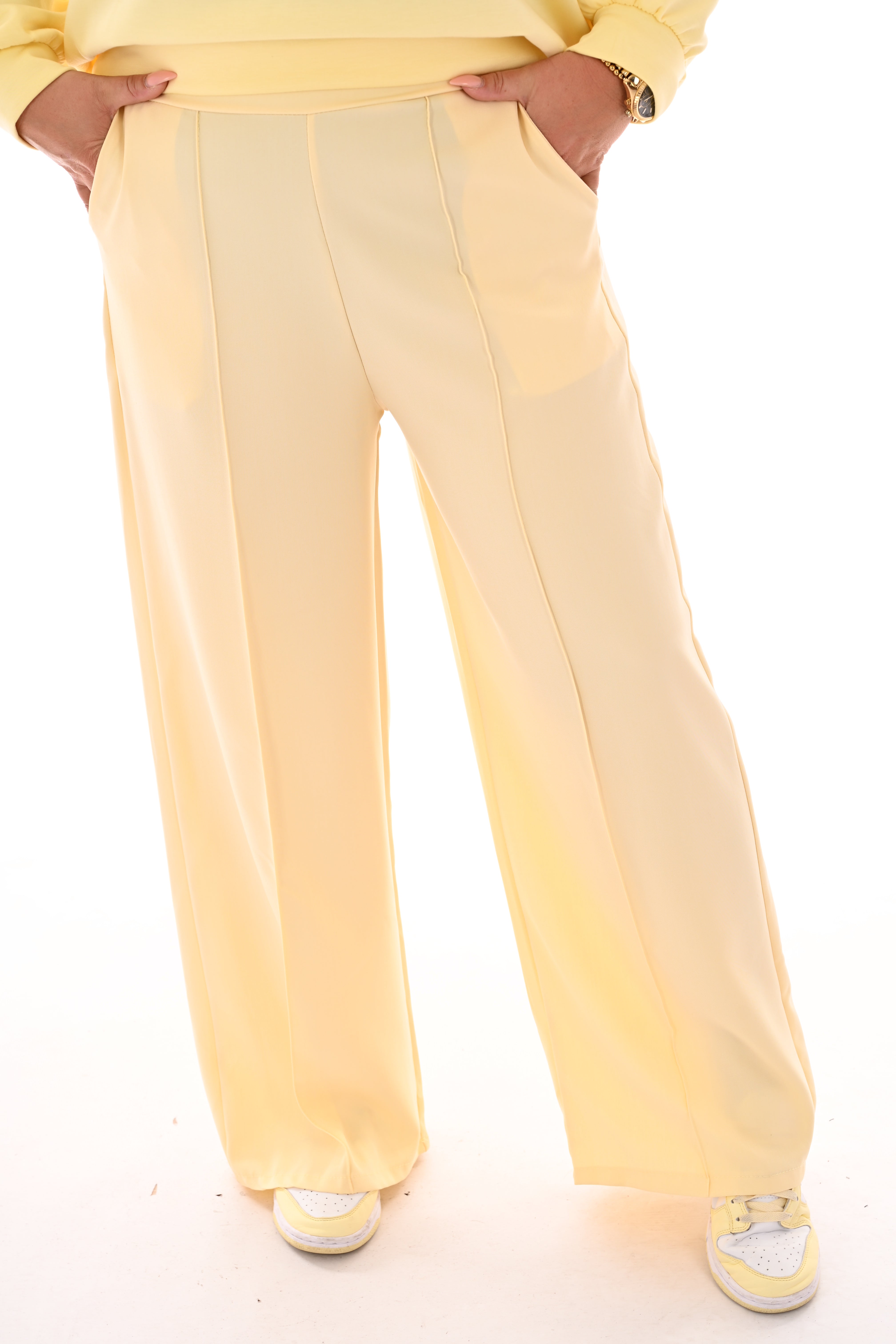 Wijde pantalon met elastieken taille botergeel