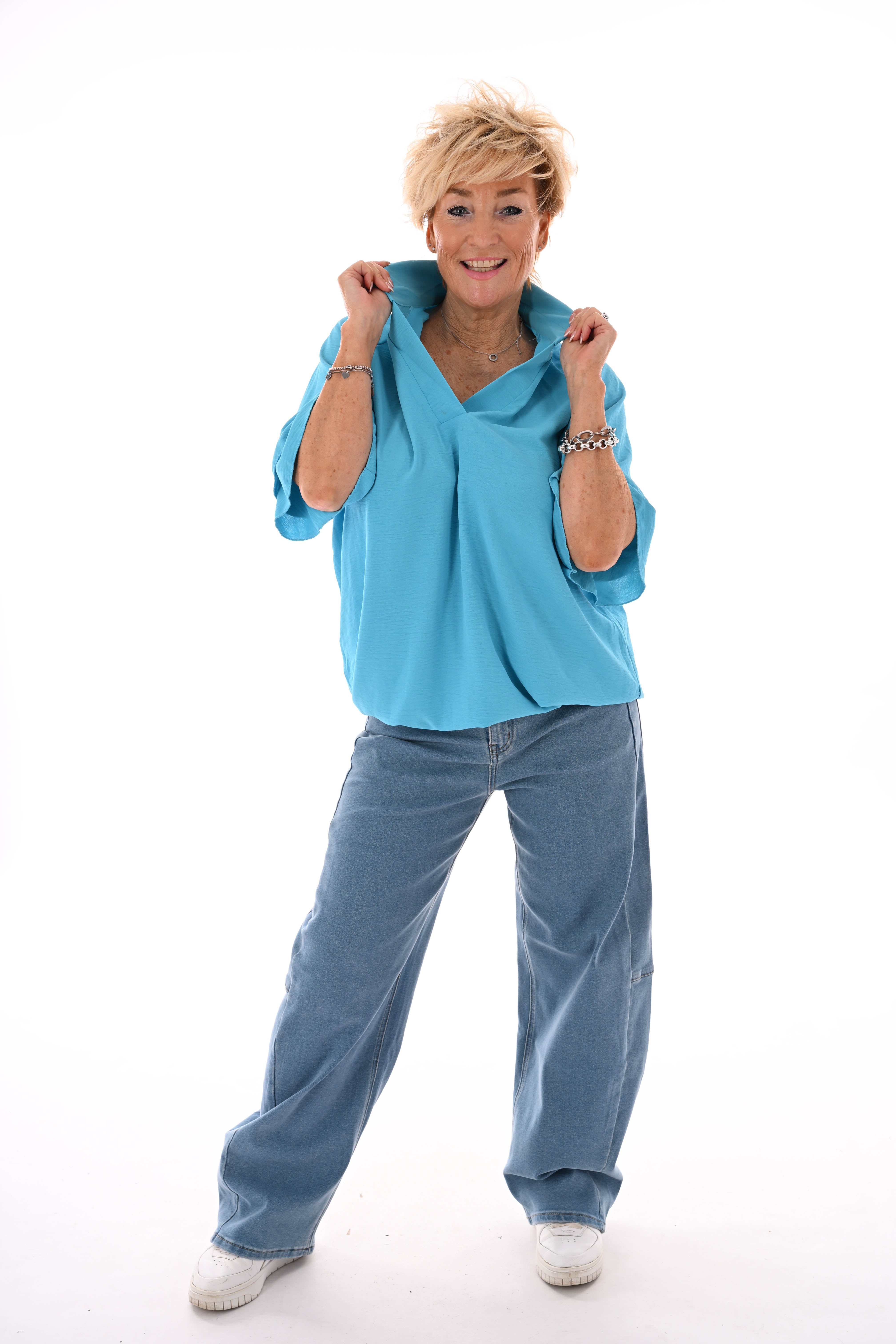 Top v-hals met korte roezelmouwen aquablauw