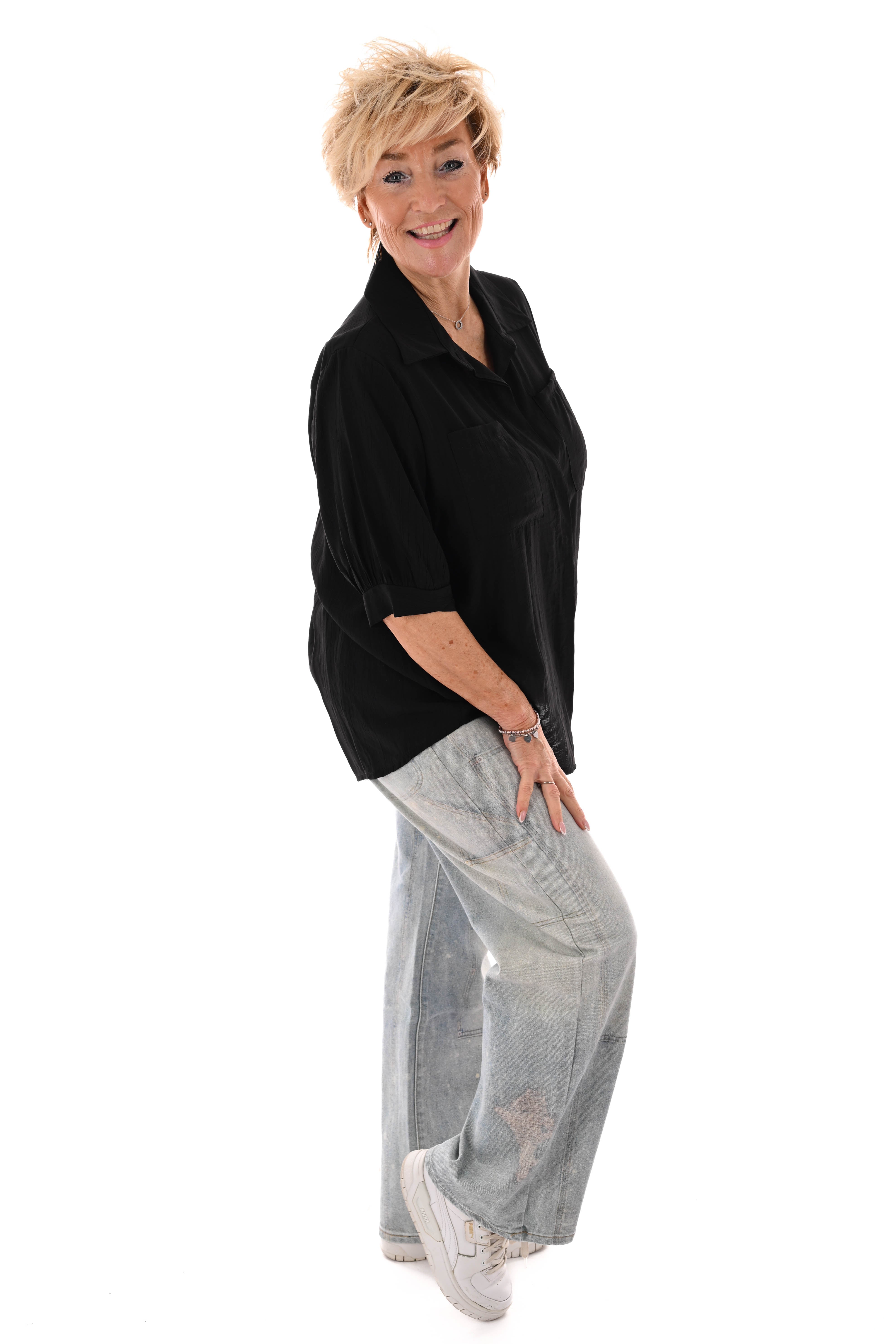 Doorknoop blouse met borstzakken uni zwart