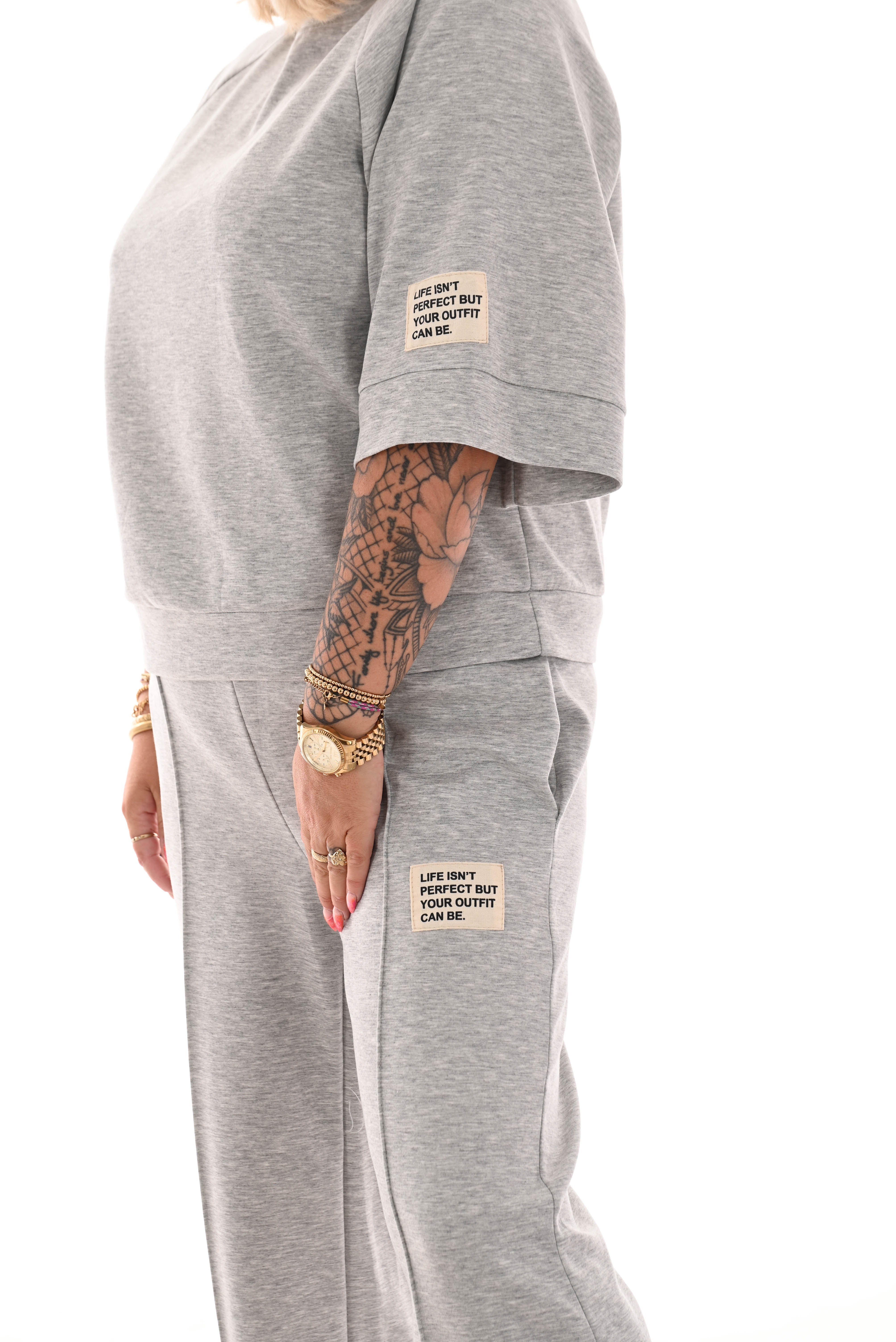 Tweedelig joggingspak applicatie wijde pijp grijs