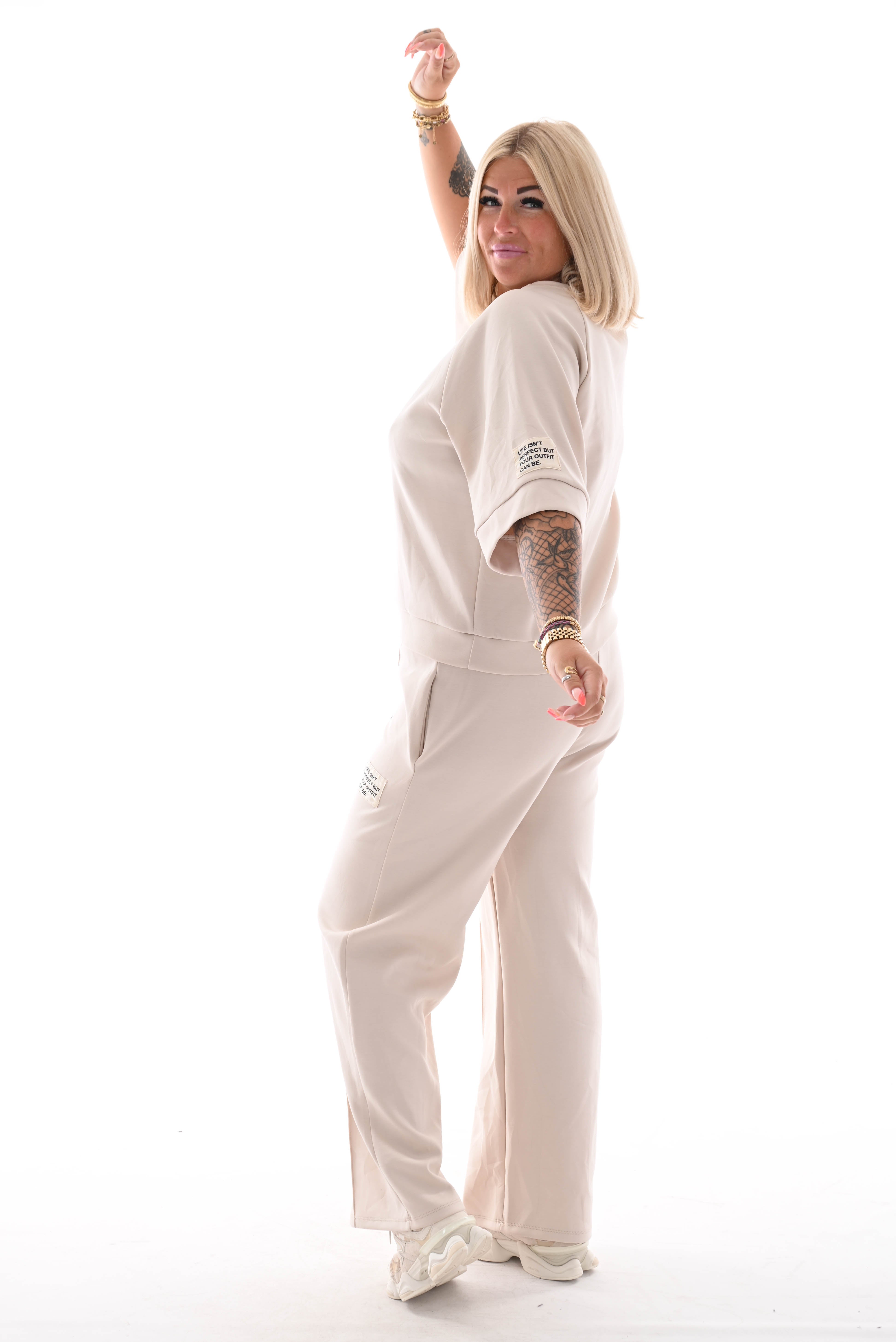 Tweedelig joggingspak applicatie wijde pijp beige