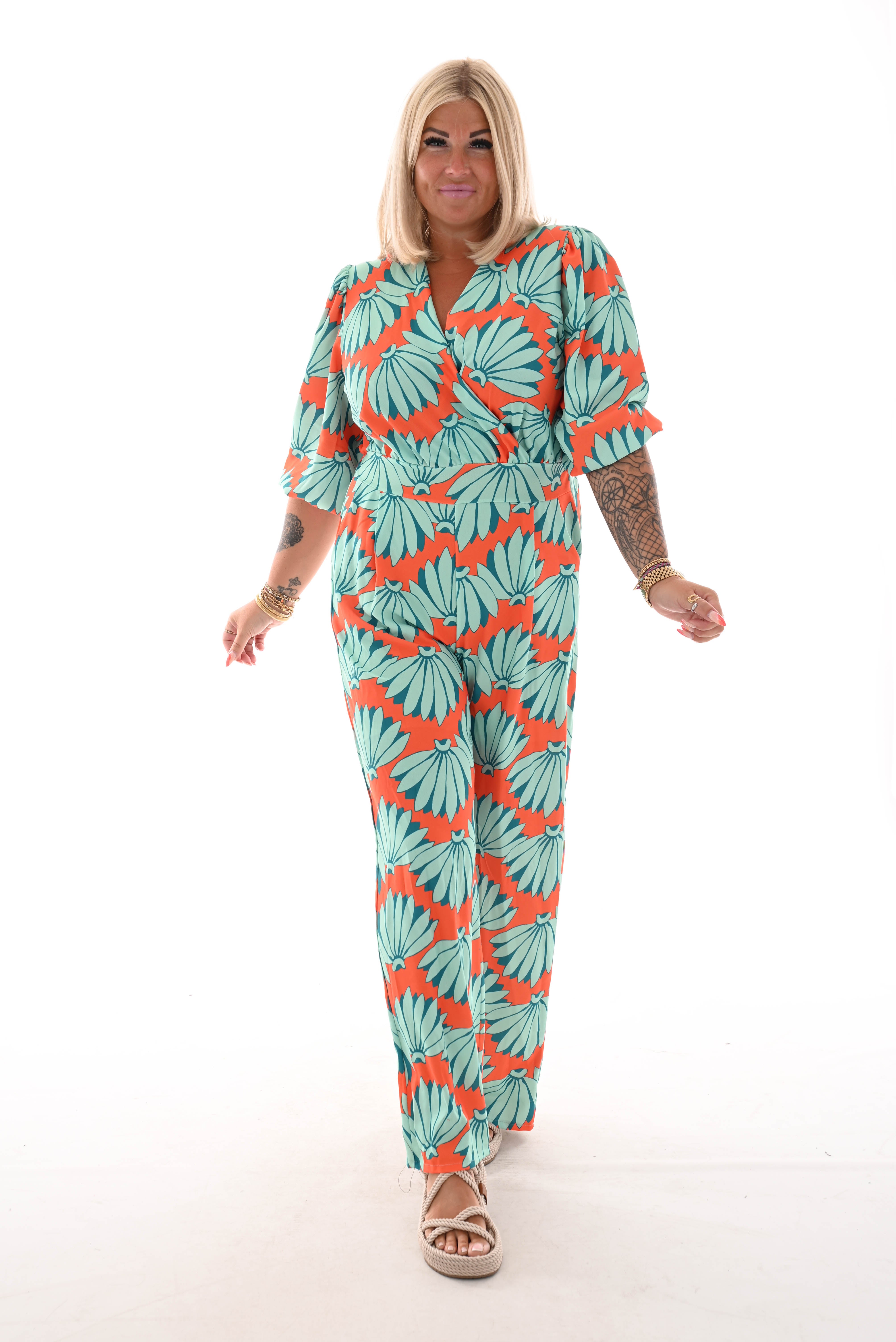 Jumpsuit overslag print bloemen oranje/turquoise