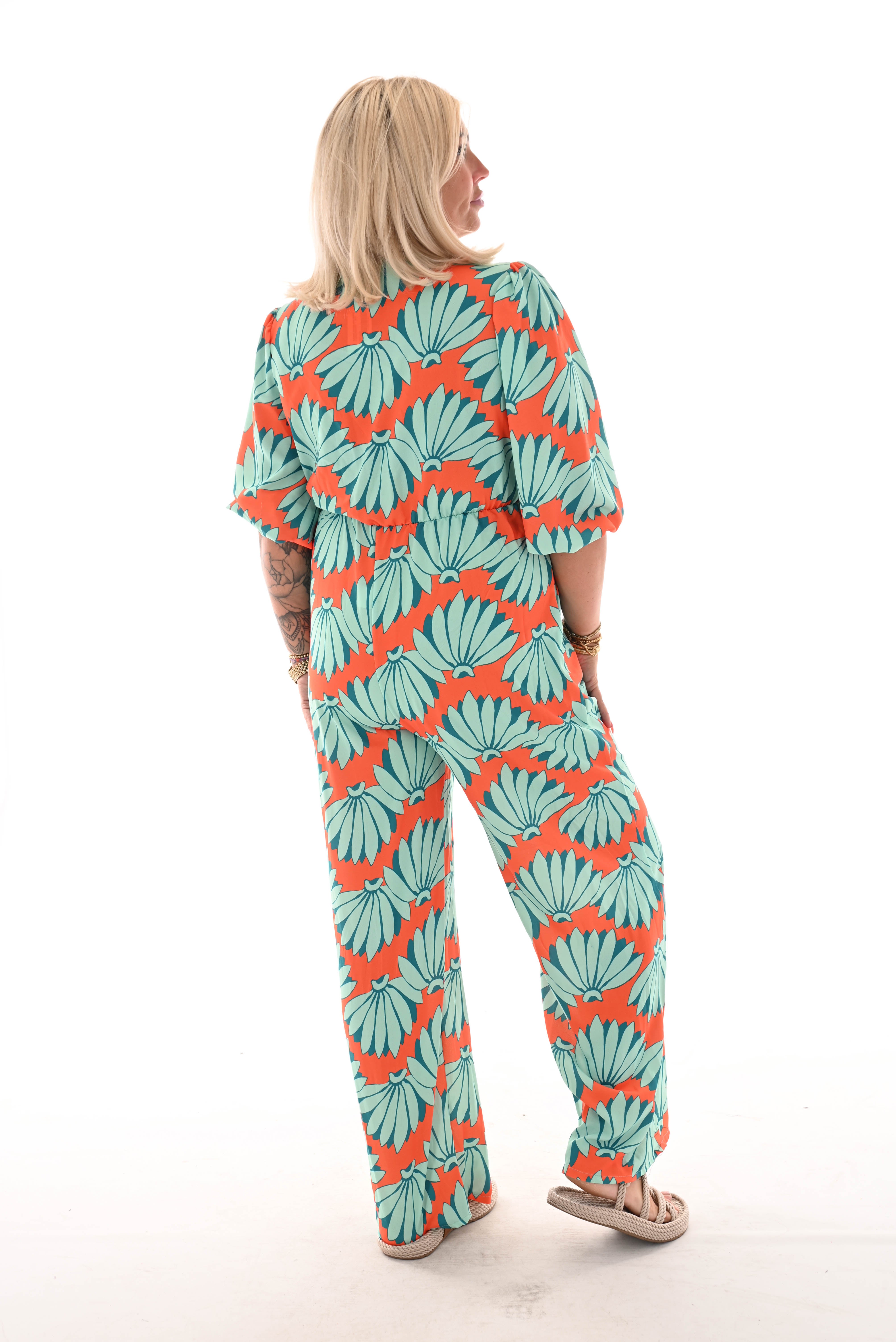 Jumpsuit overslag print bloemen oranje/turquoise