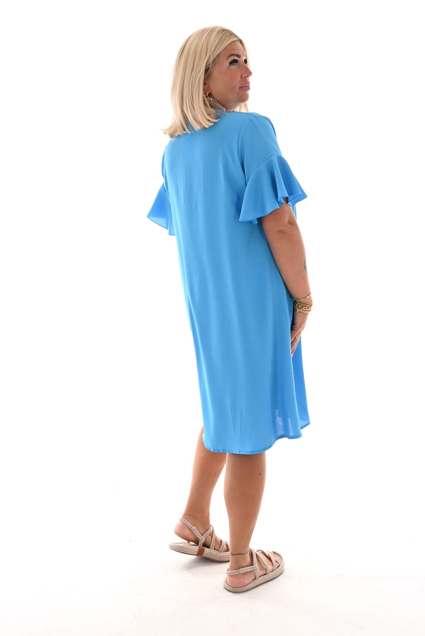 Jurk v-hals roezelmouwen uni blauw