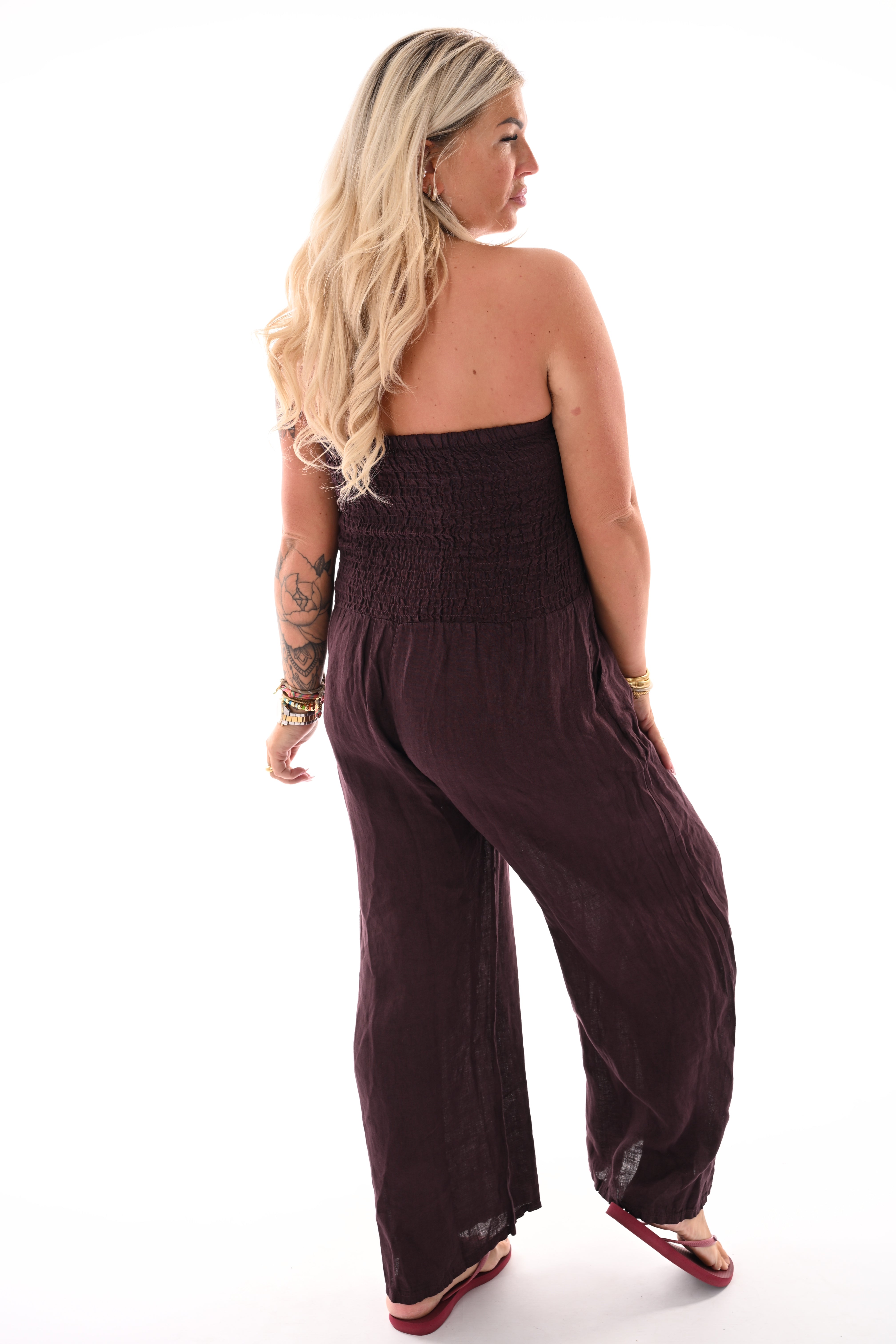 Off-shoulder jumpsuit smock detail aubergine