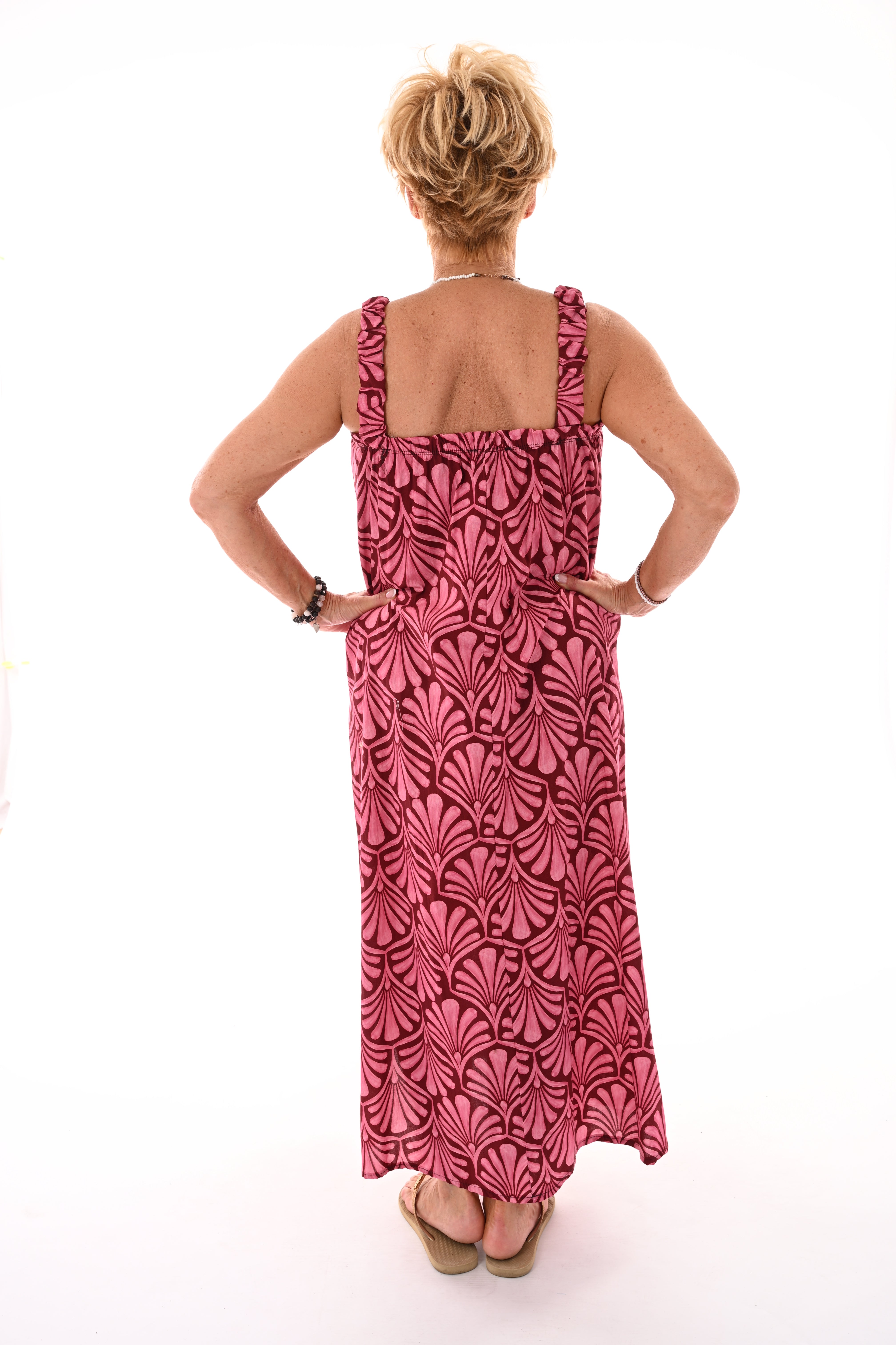 Lange jurk mouwloos bladprint roze/bordeaux