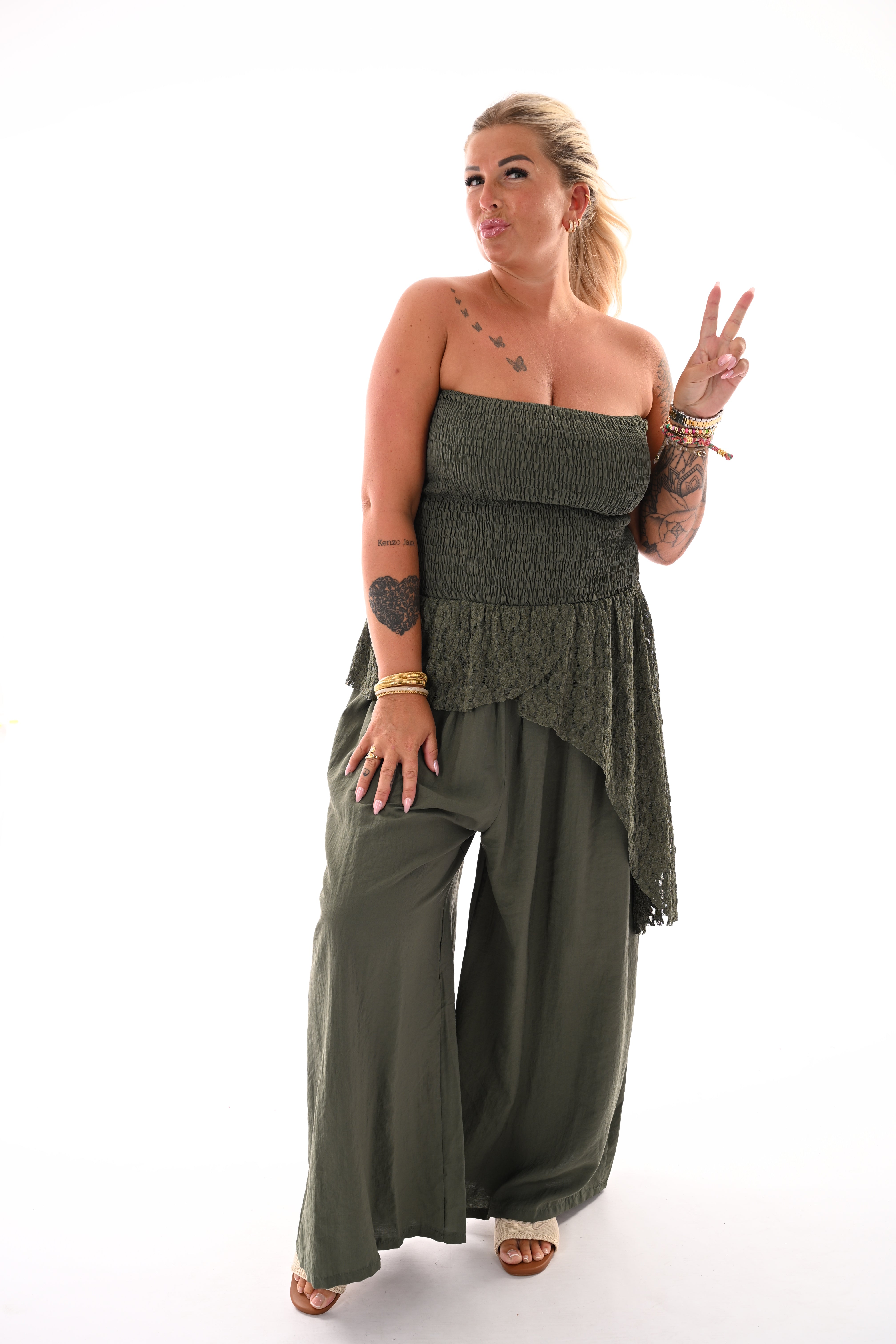 Off-shoulder jumpsuit kanten detail legergroen