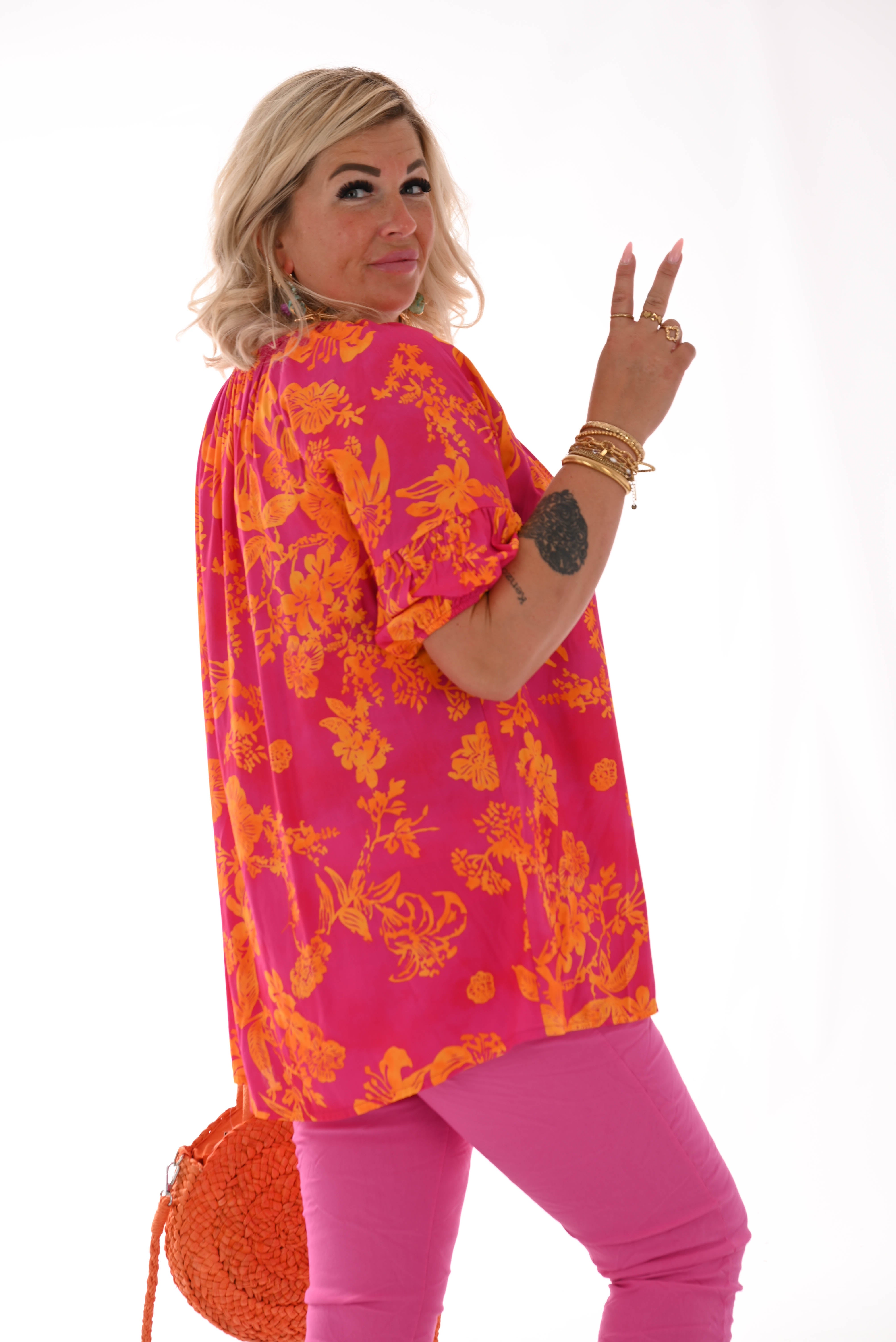 Doorknoop top pofmouwen bloemenprint fuchsia/oranje