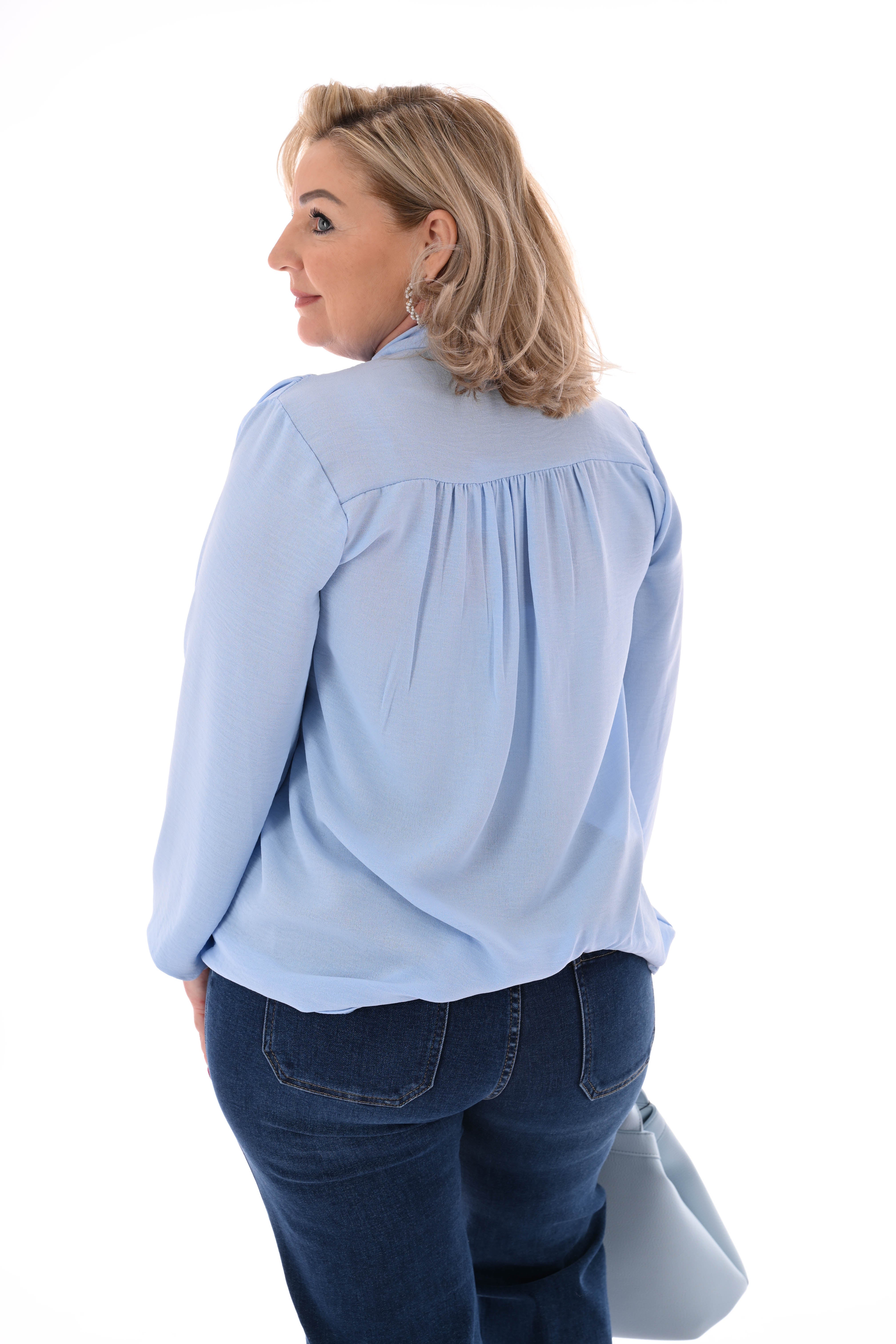 Top lange mouwen met strik lichtblauw