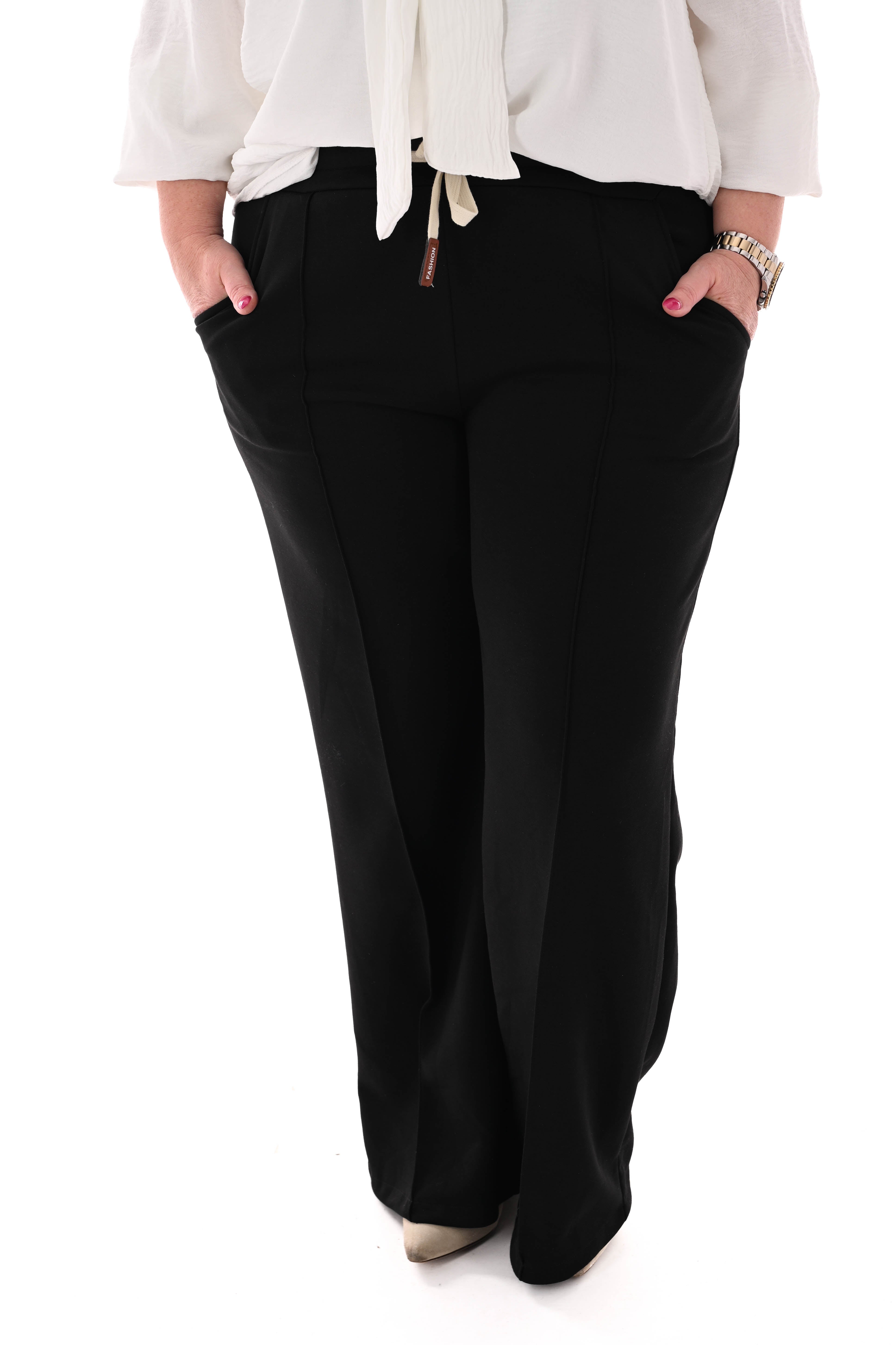 Wijde joggingsbroek met naad uni zwart