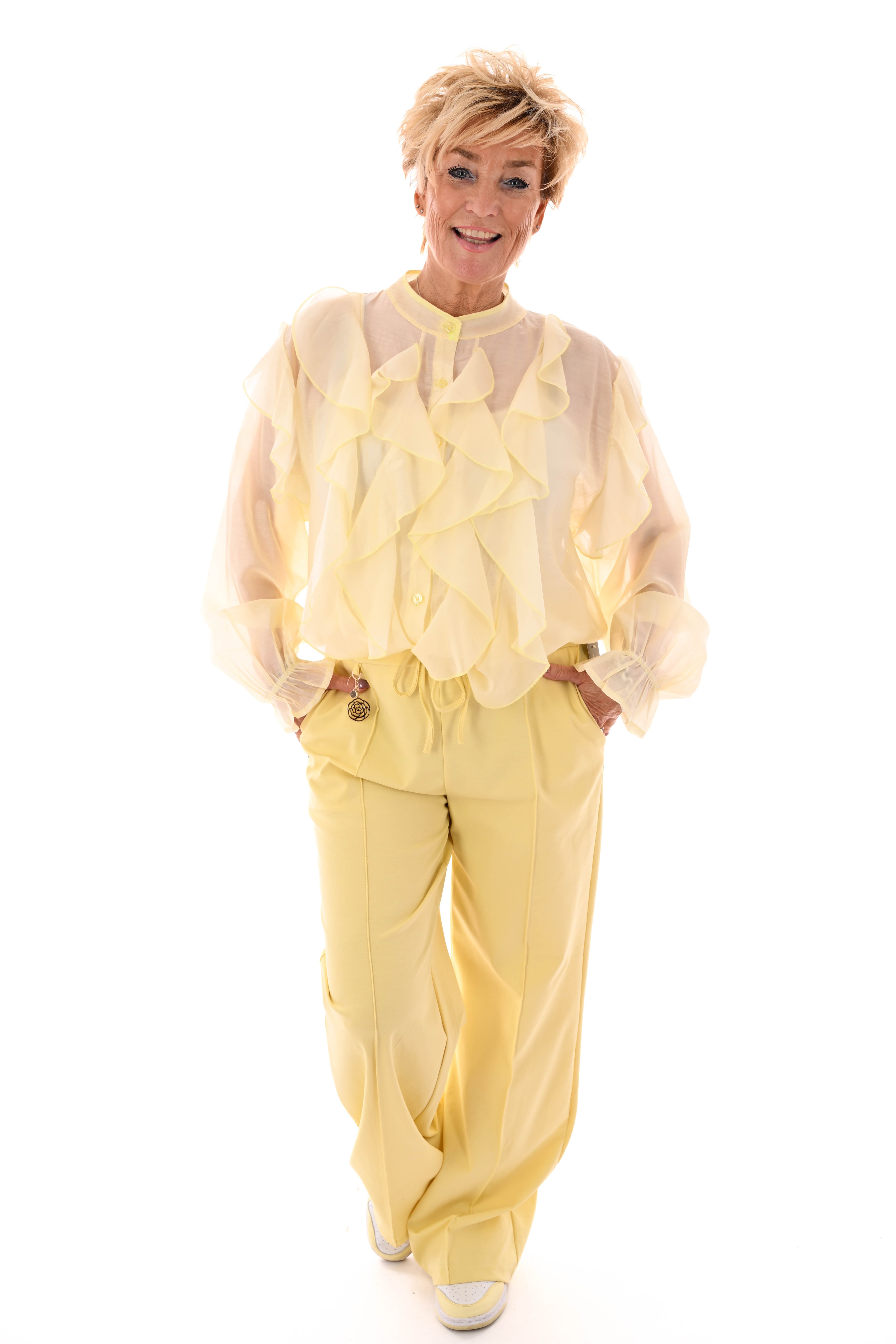 Wijde broek met brede elastieken band botergeel