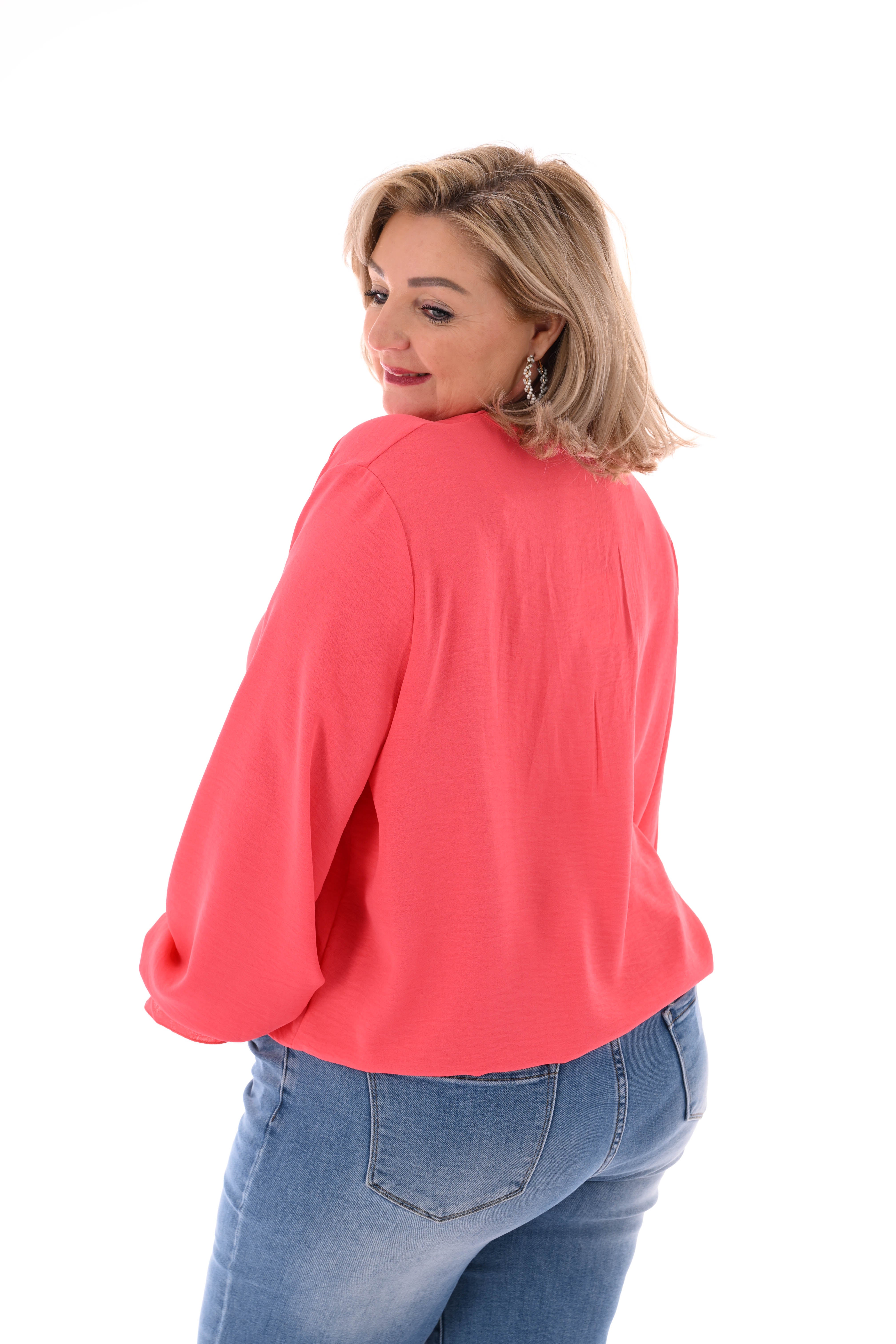 Top trompetmouwen v-hals uni koraal