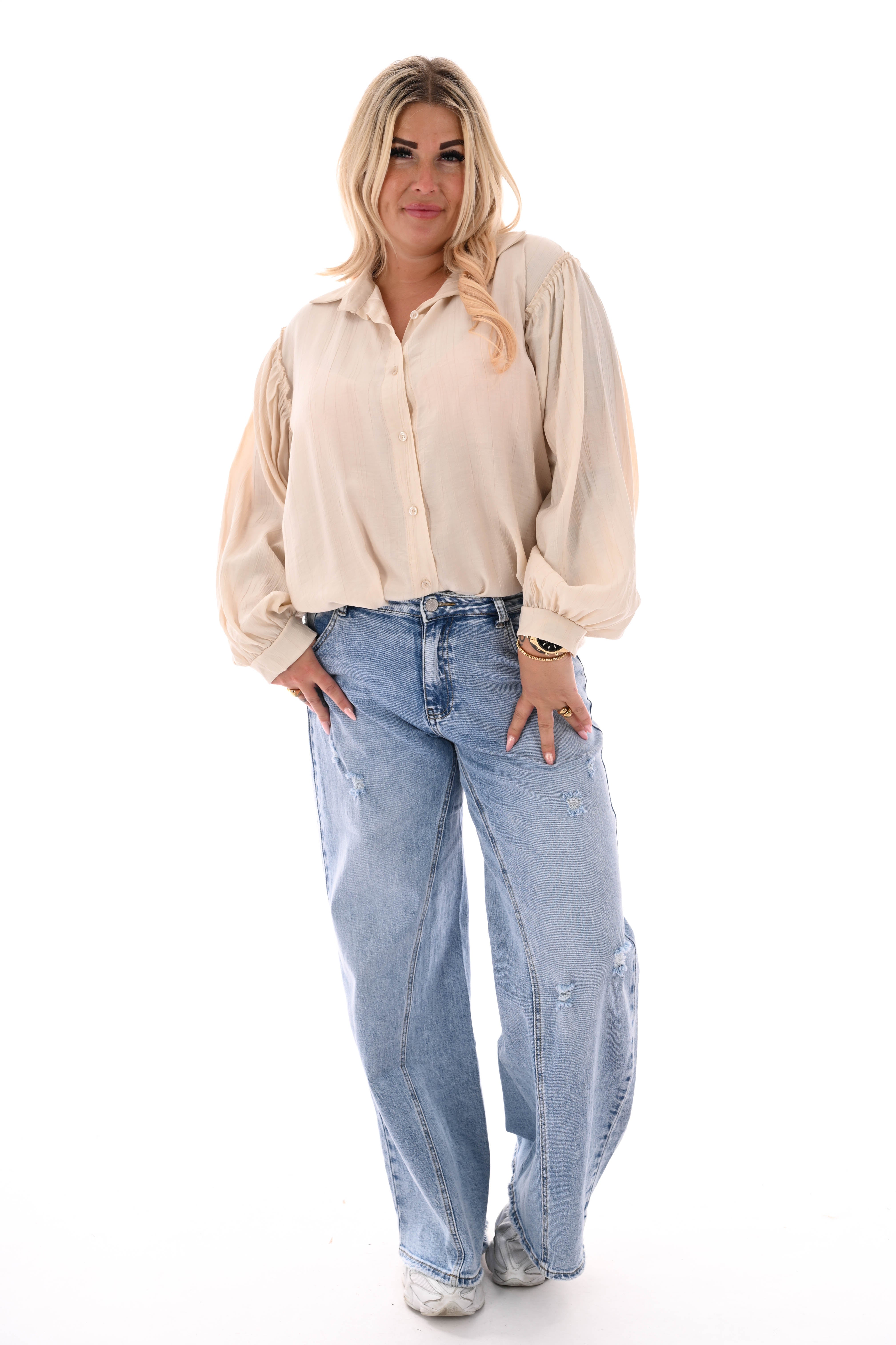 Blouse met roezelranden beige