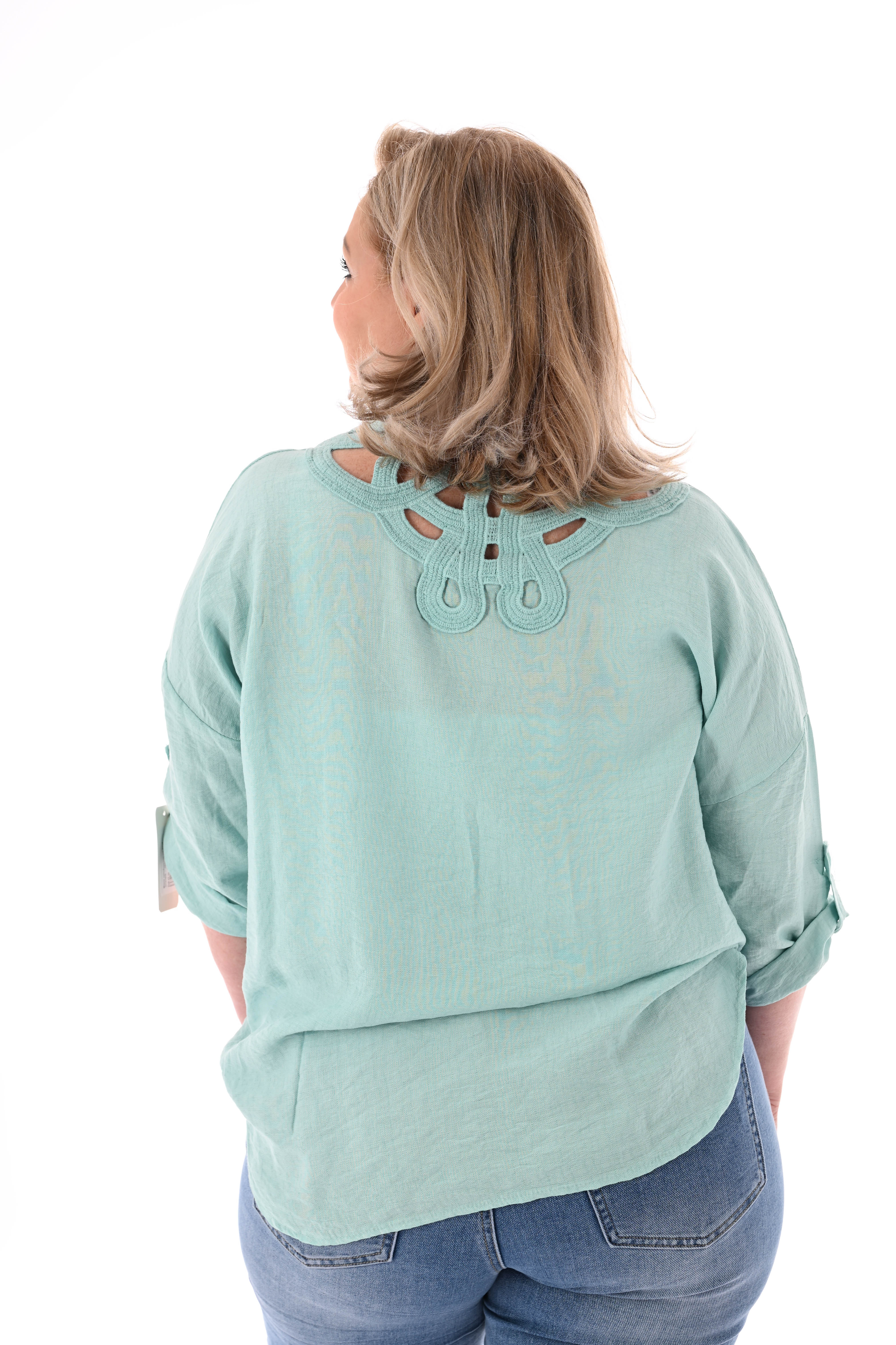 Blouse ophaalmouwen rug detail turquoise