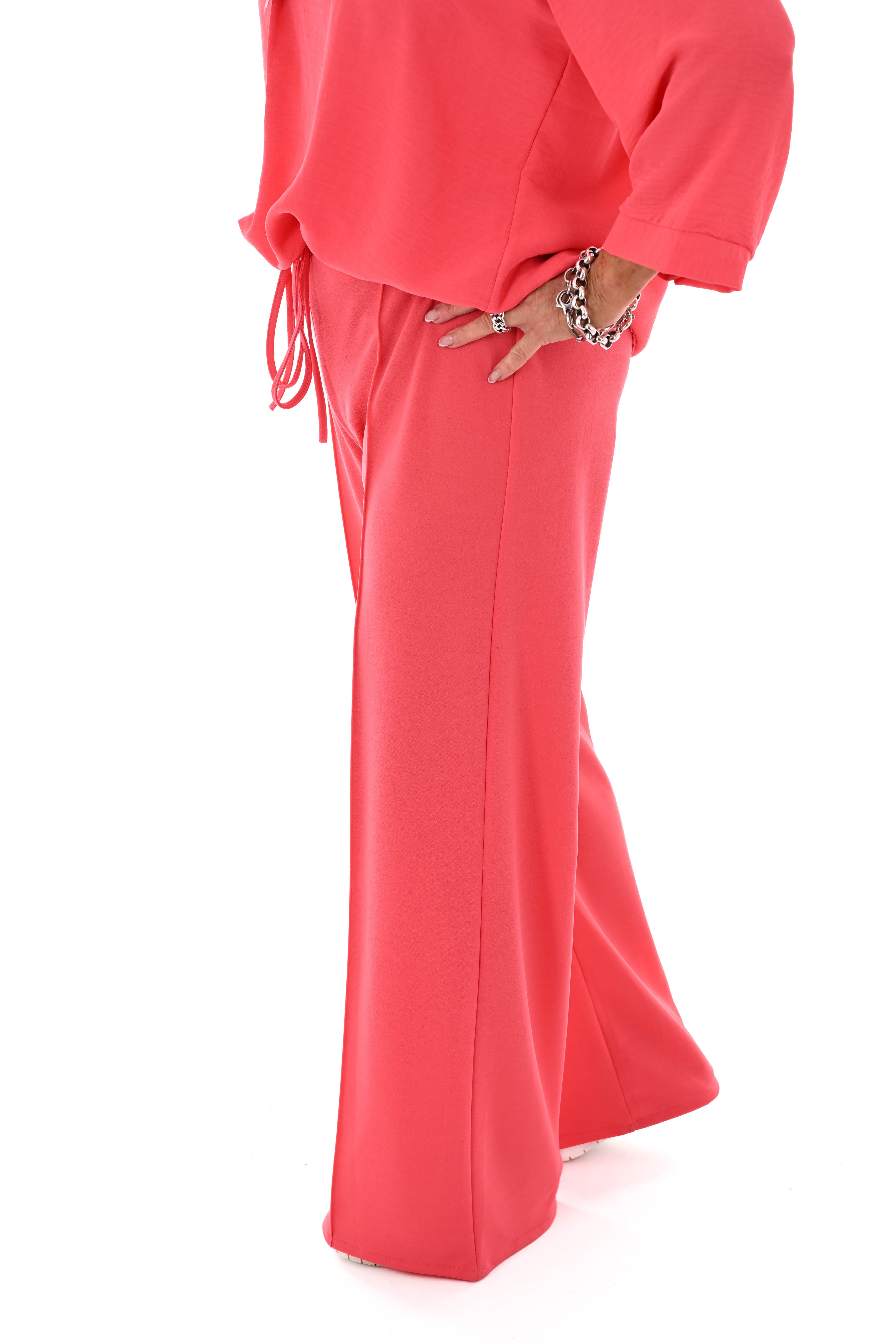 Wijde broek elastieken band met naad uni koraal