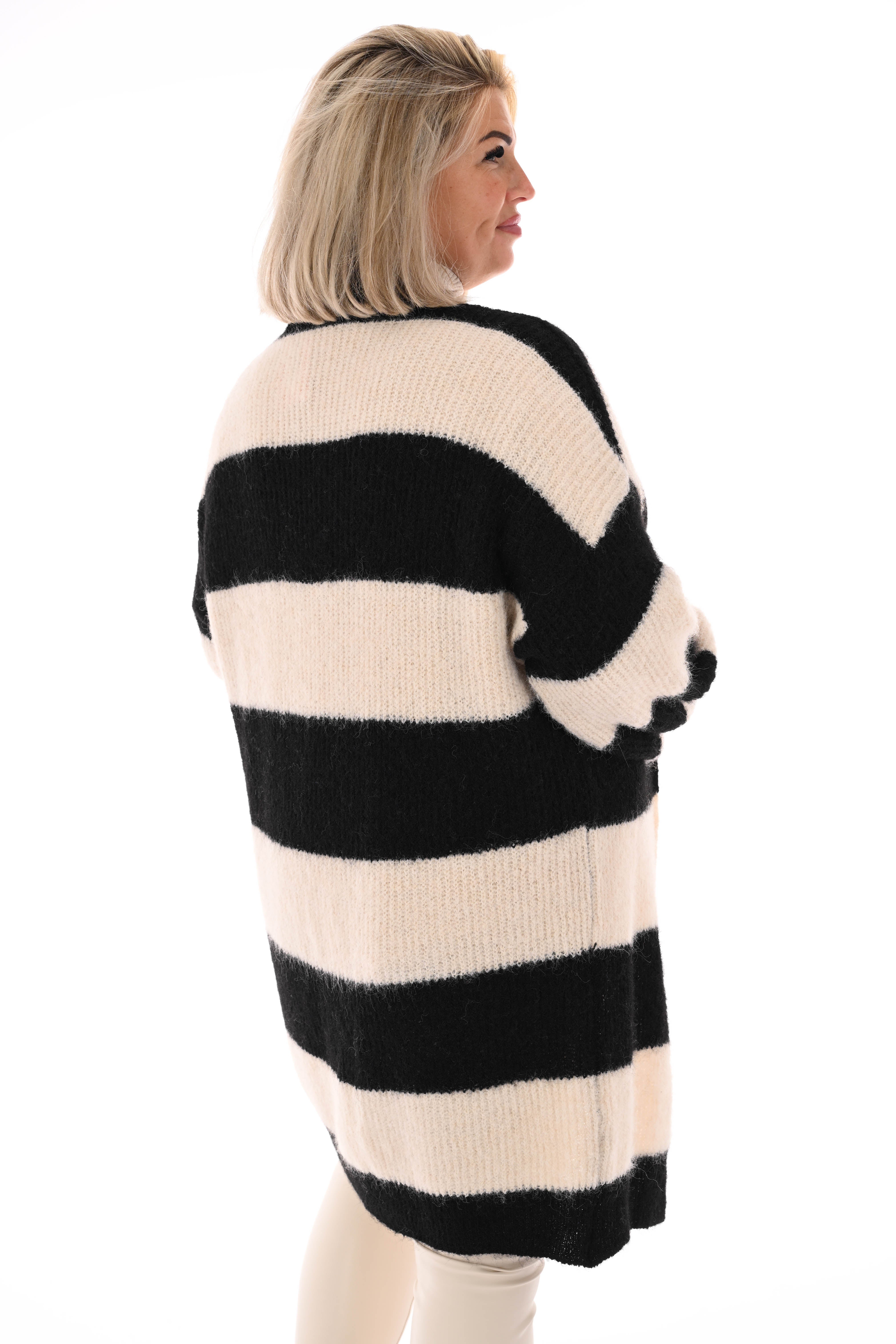 Half lang vest gestreept met pofmouwen zwart/roomwit