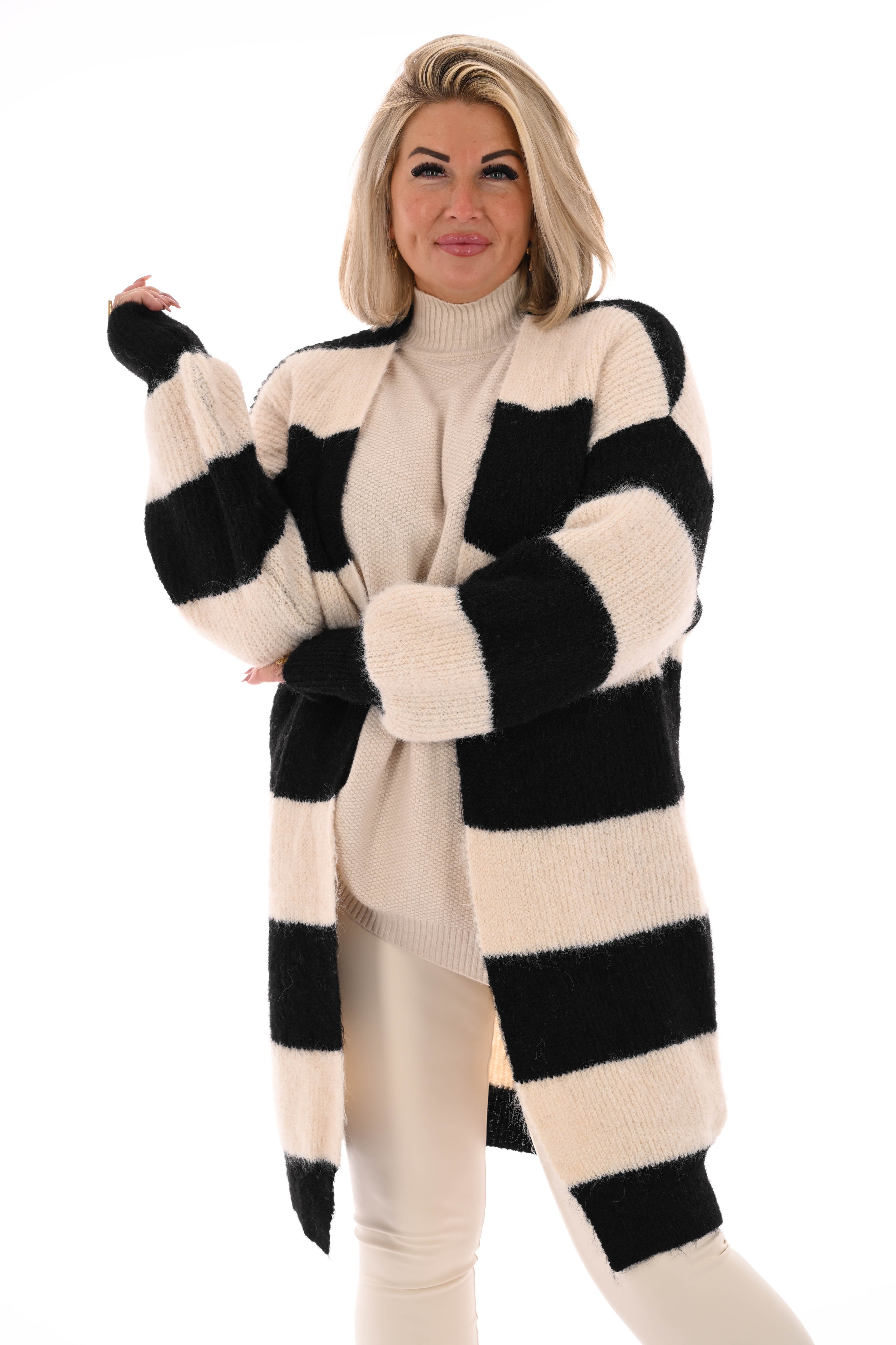 Half lang vest gestreept met pofmouwen zwart/roomwit