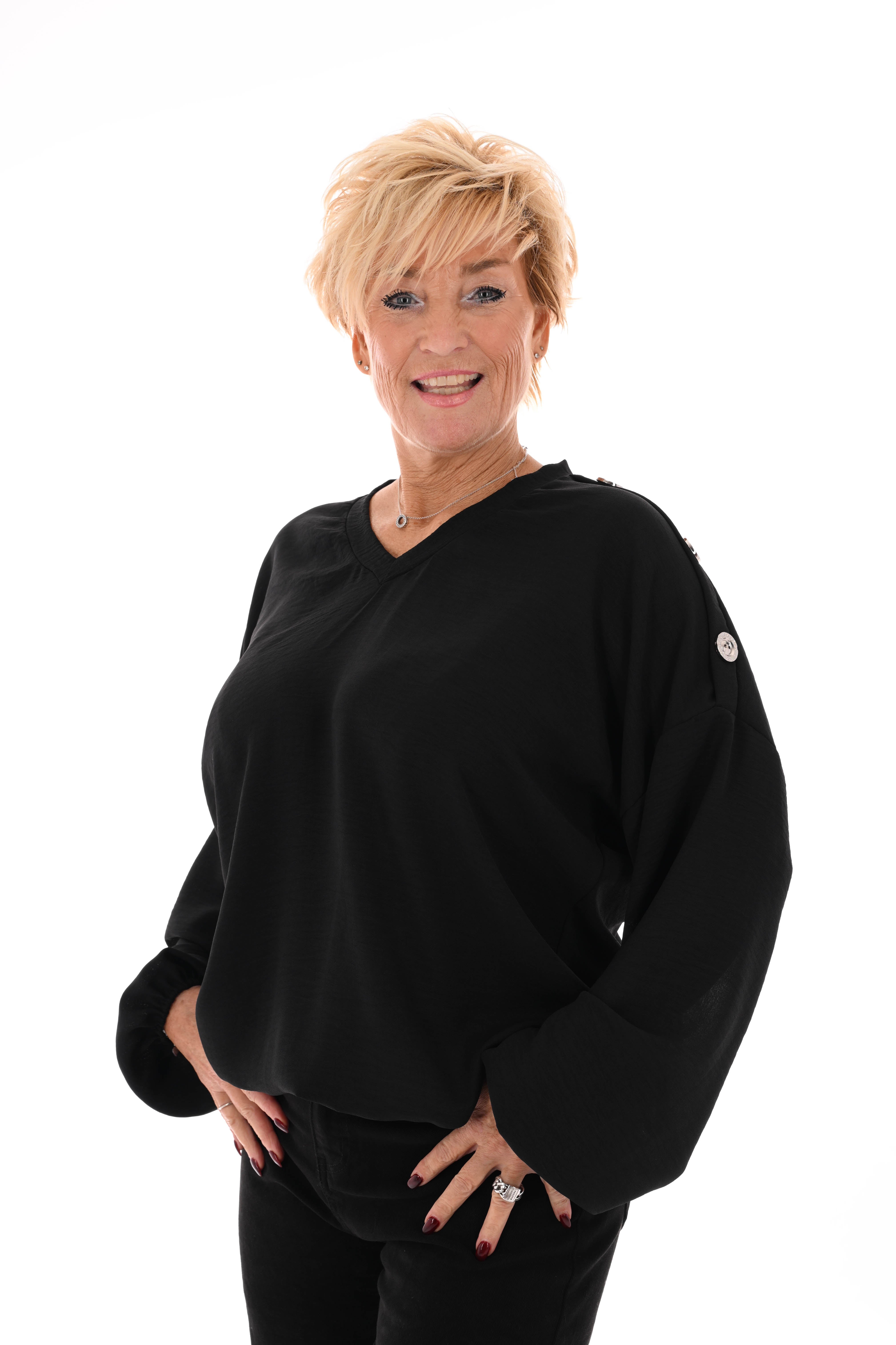 Top v-hals met knopen op de schouders zwart