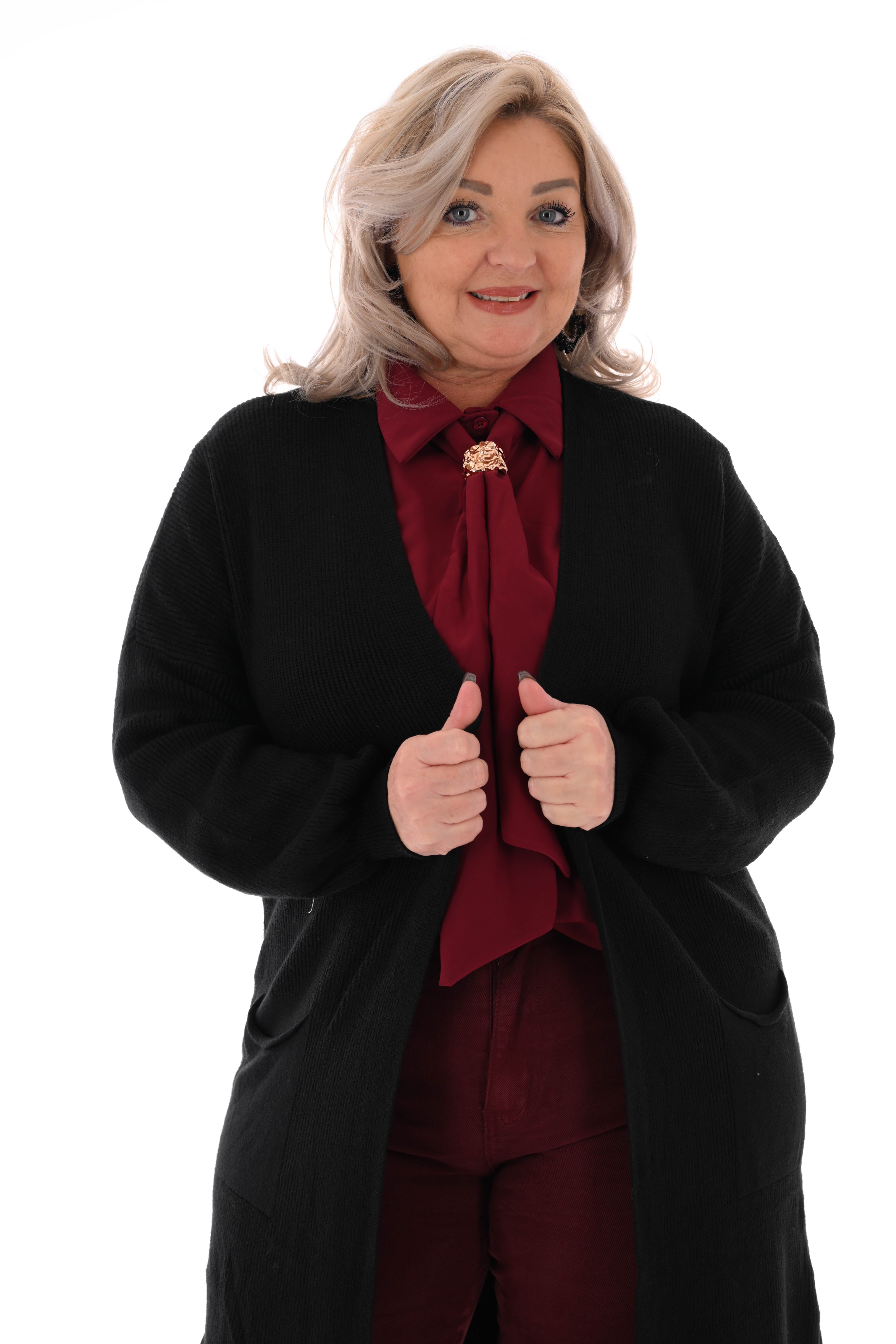 Gebreid vest pofmouwen zwart