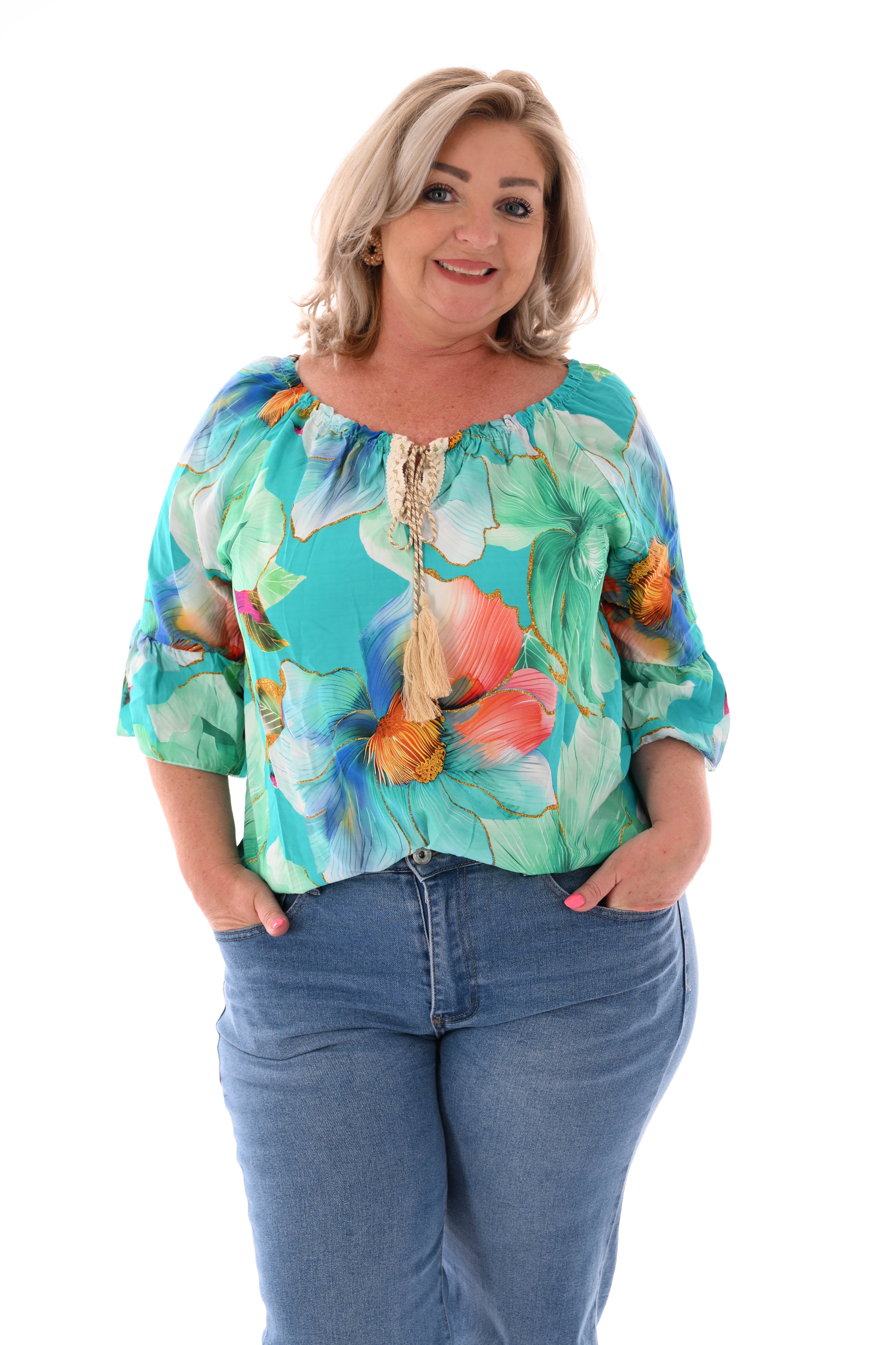 Blouse met bloemen en trompetmouwen aquablauw
