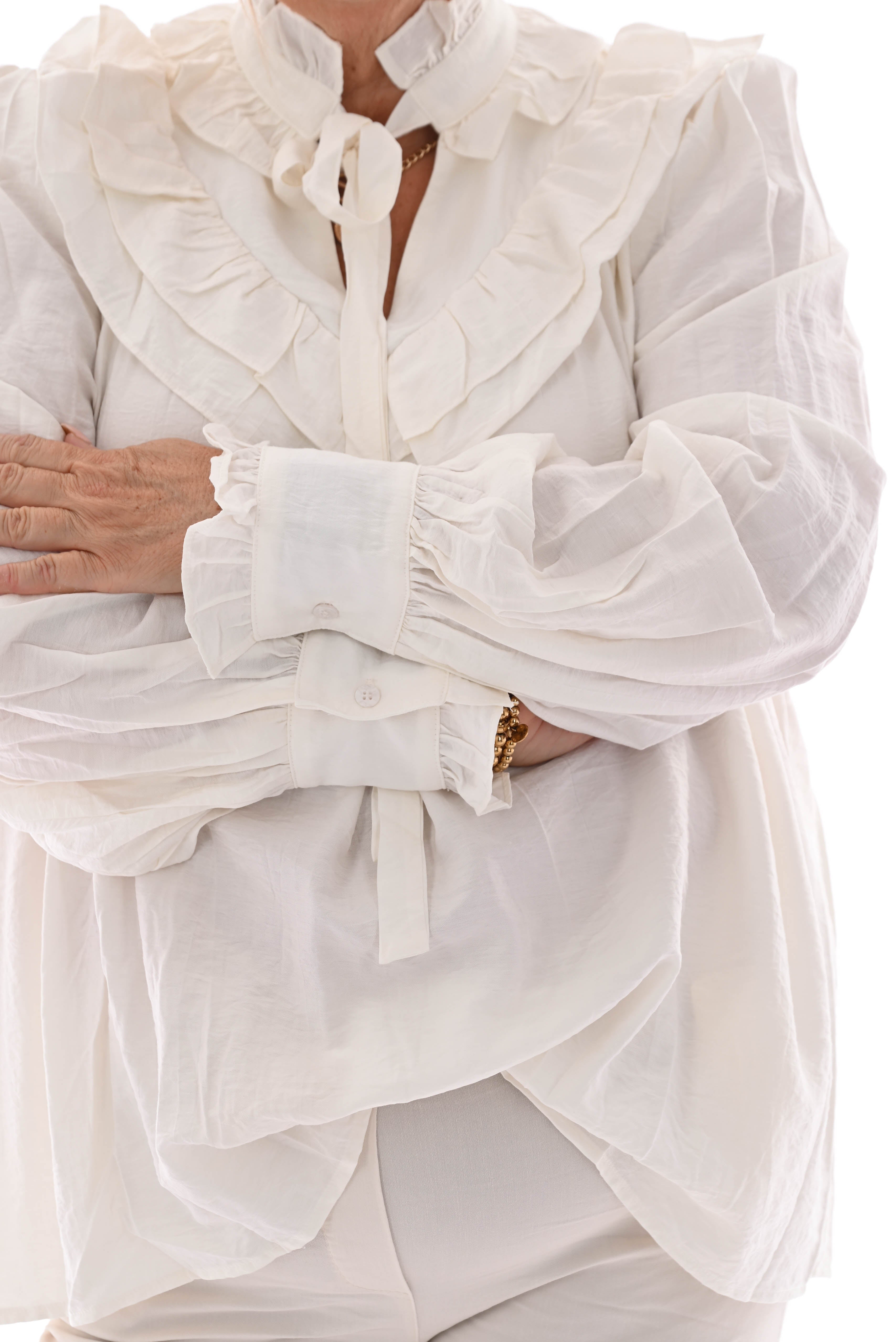Blouse met strik en roezels roomwit