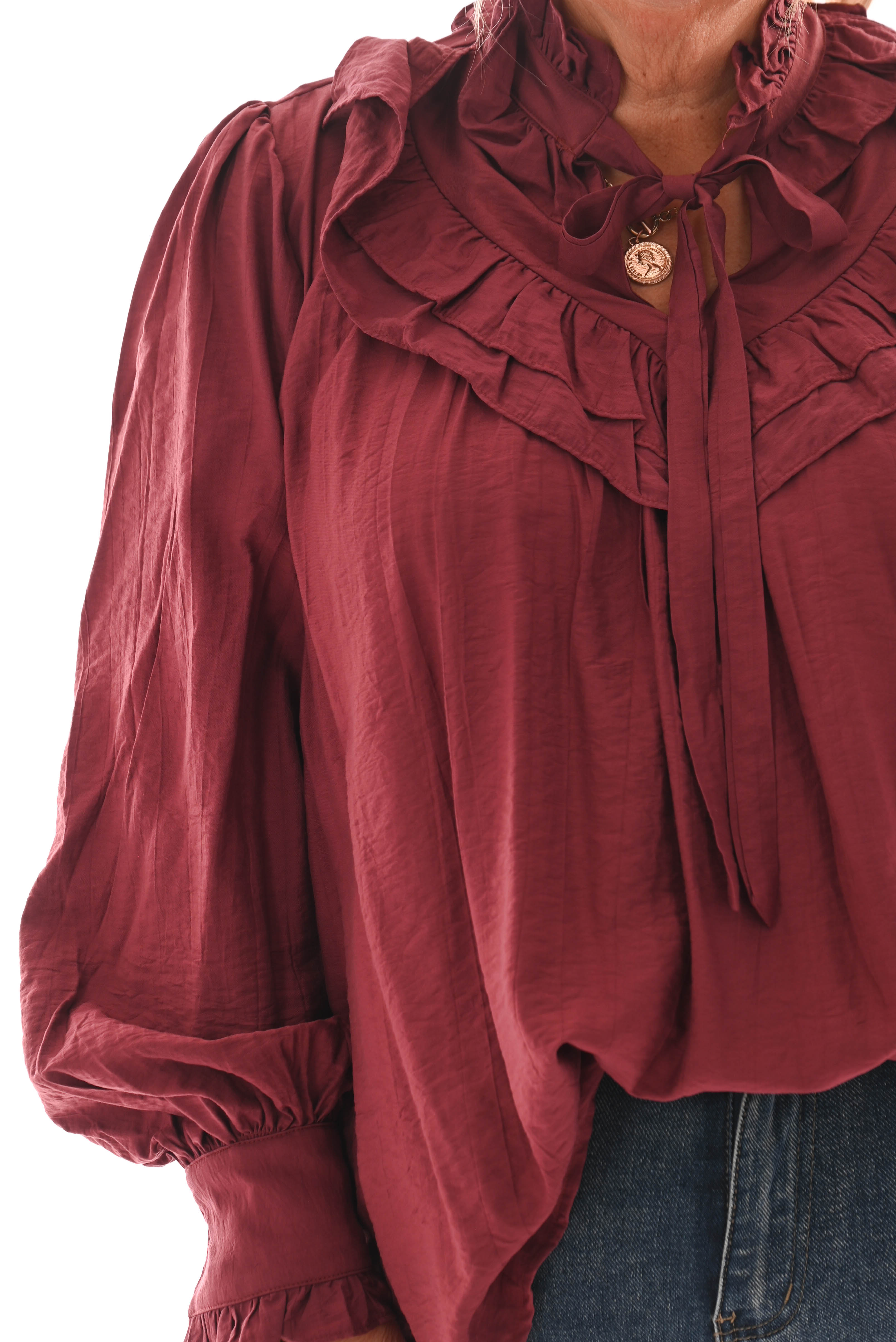 Blouse met strik en roezels bordeaux