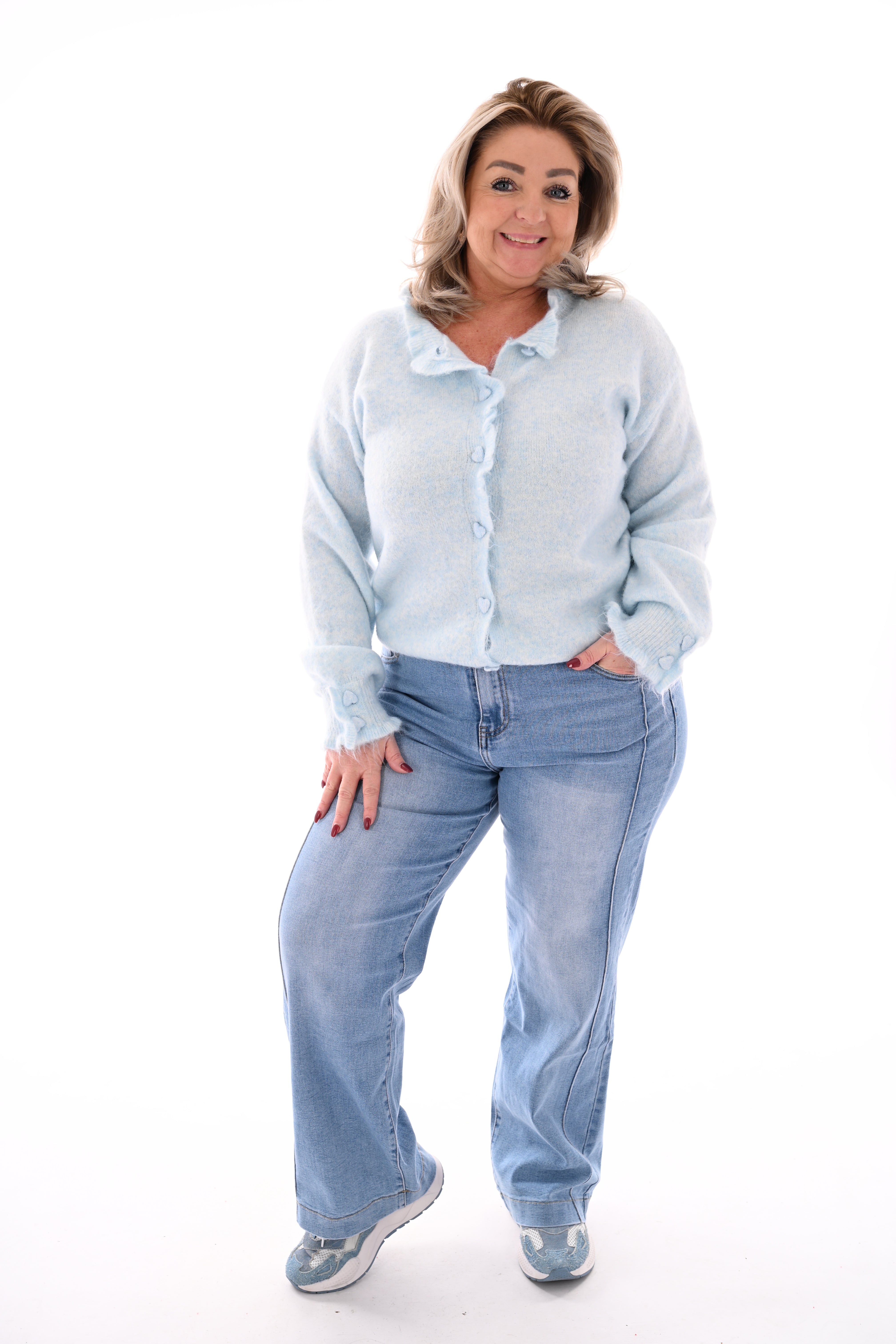 Vest knopen met roezelmouwen lichtblauw