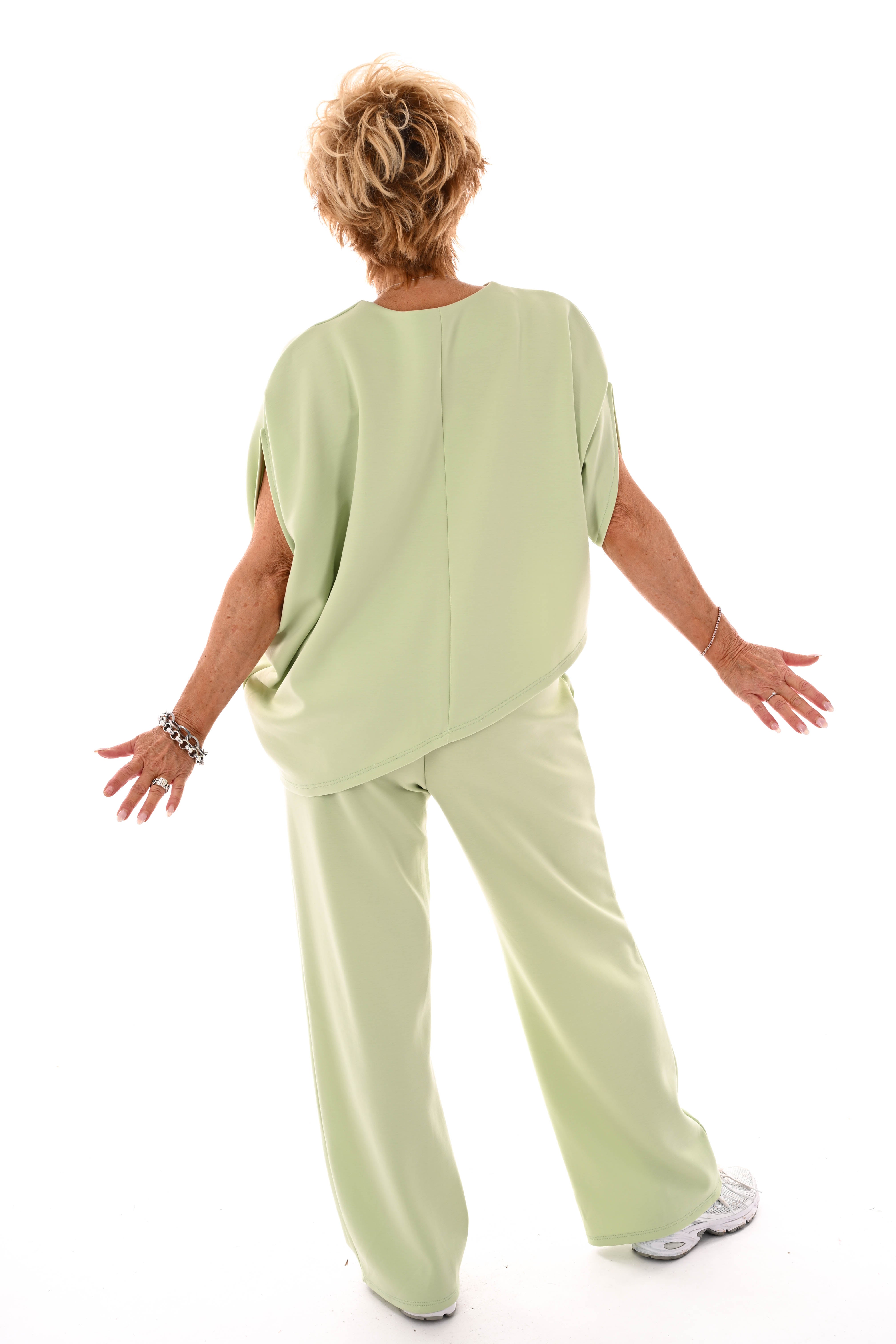 Tweedelig set asymmetrisch korte mouwen lichtgroen