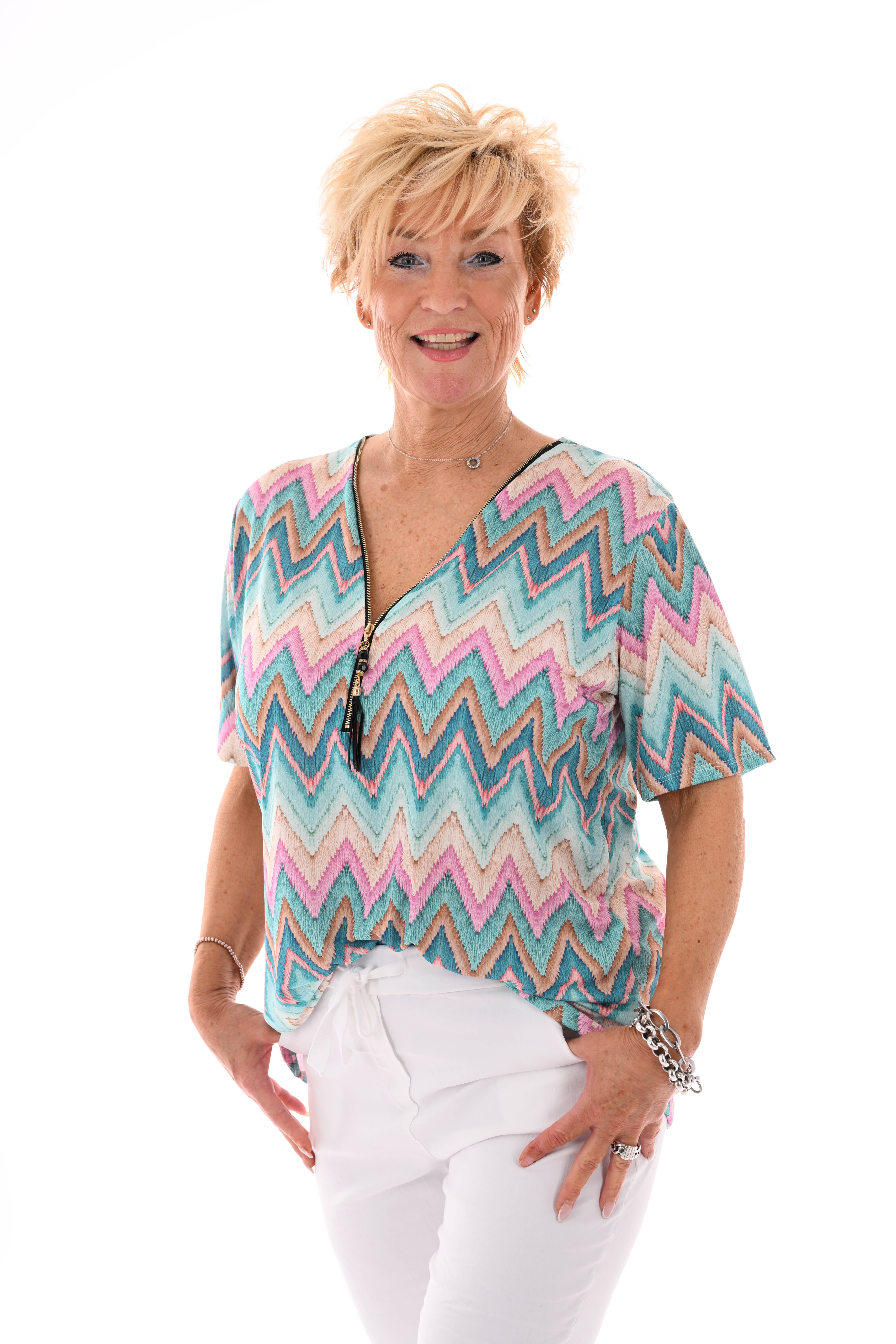 Top met rits zigzag turquoise/roze