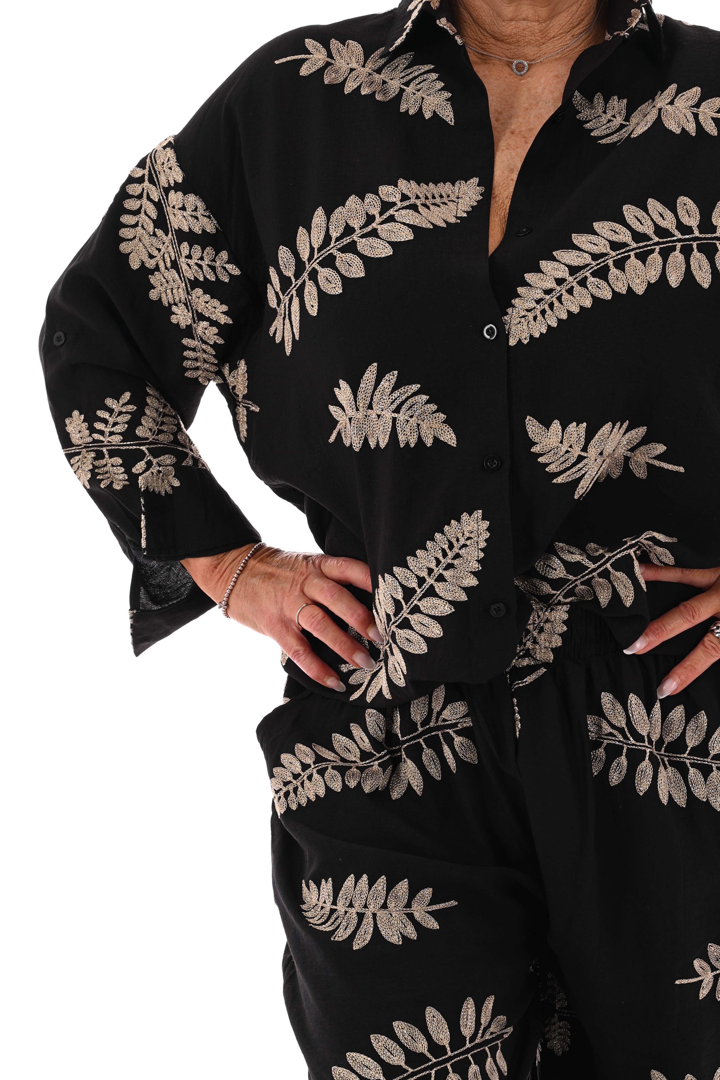 Tweedelig set met bladeren zwart