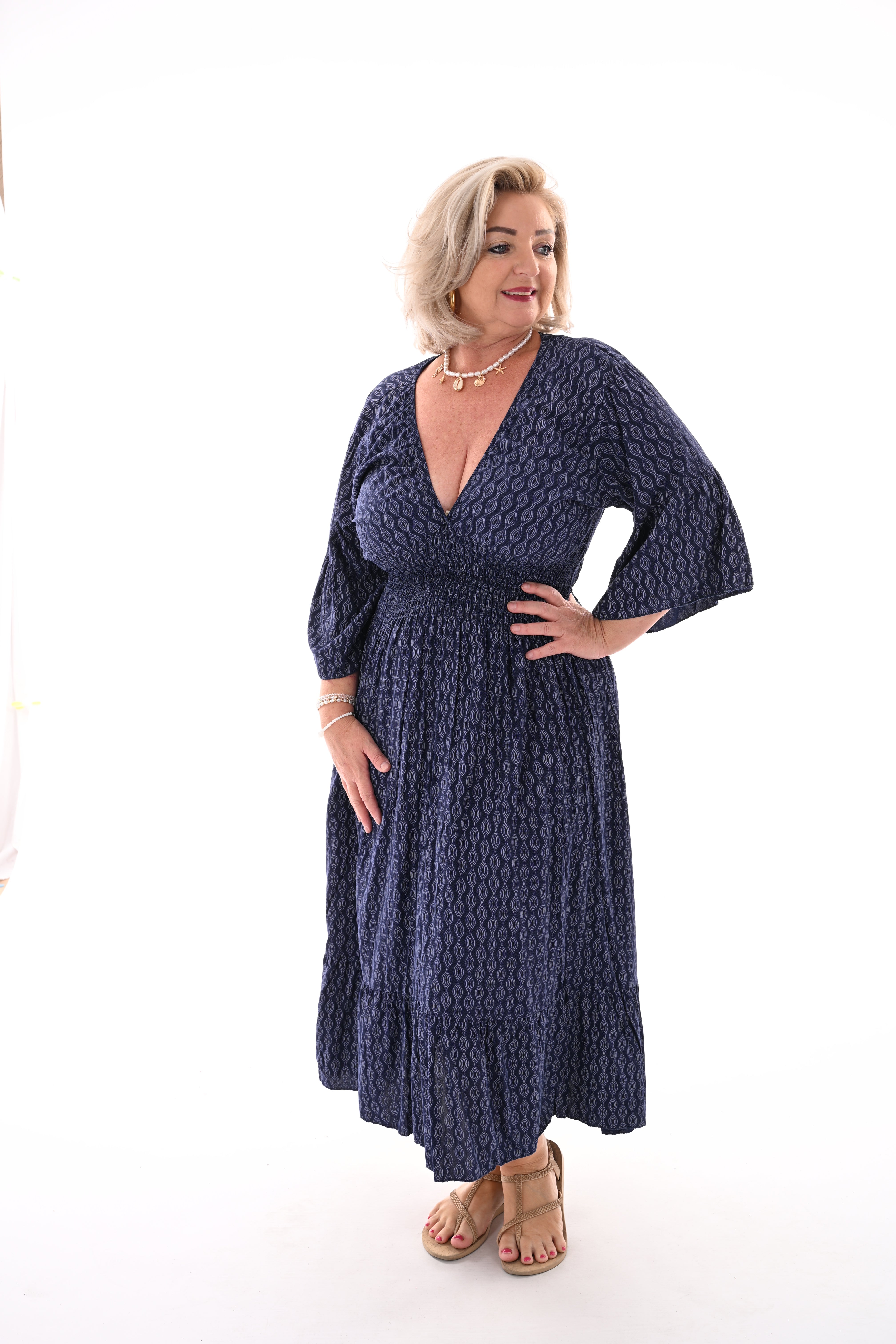 Midi jurk v-hals wave patroon marineblauw