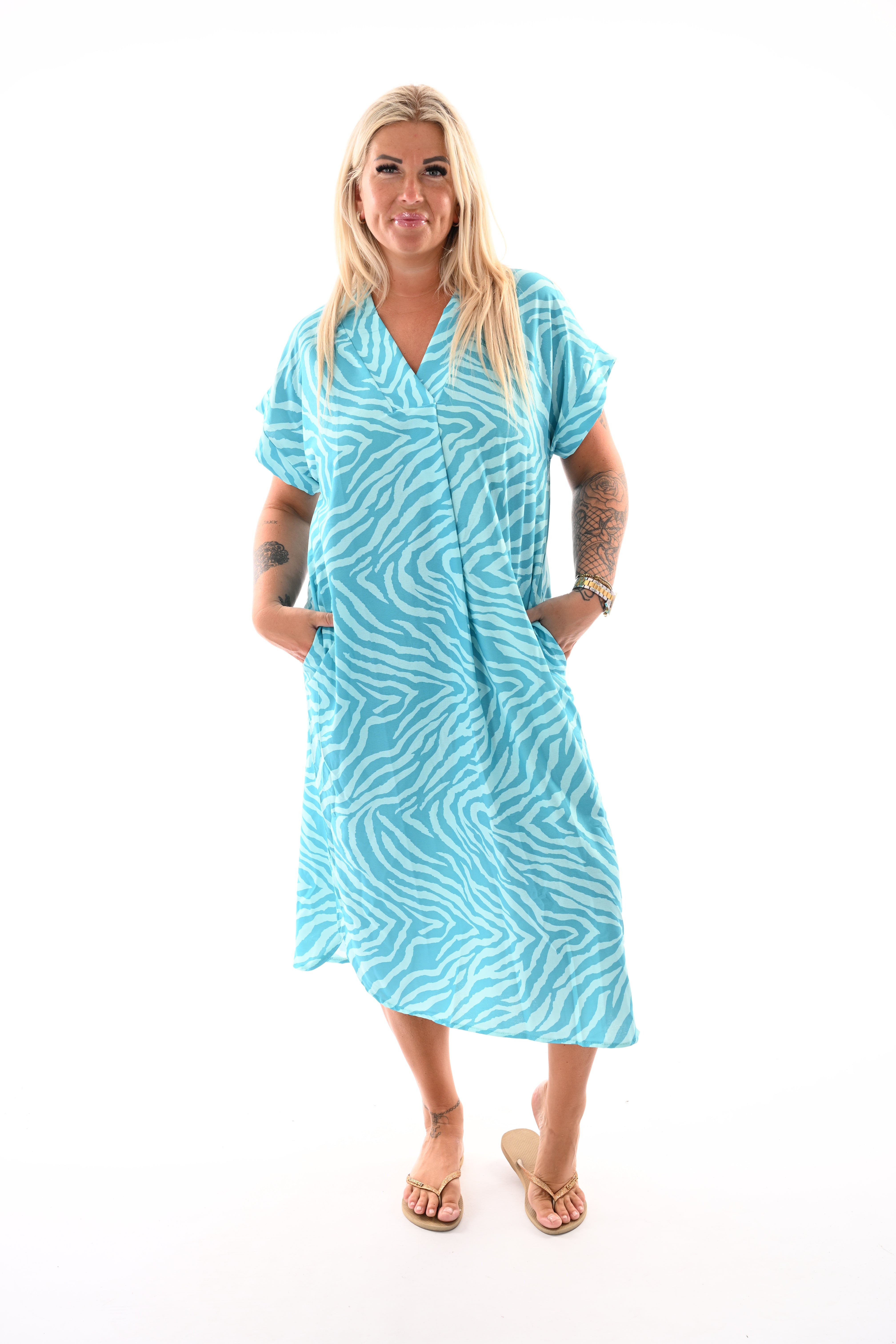 Jurk met zakken print turquoise/mint