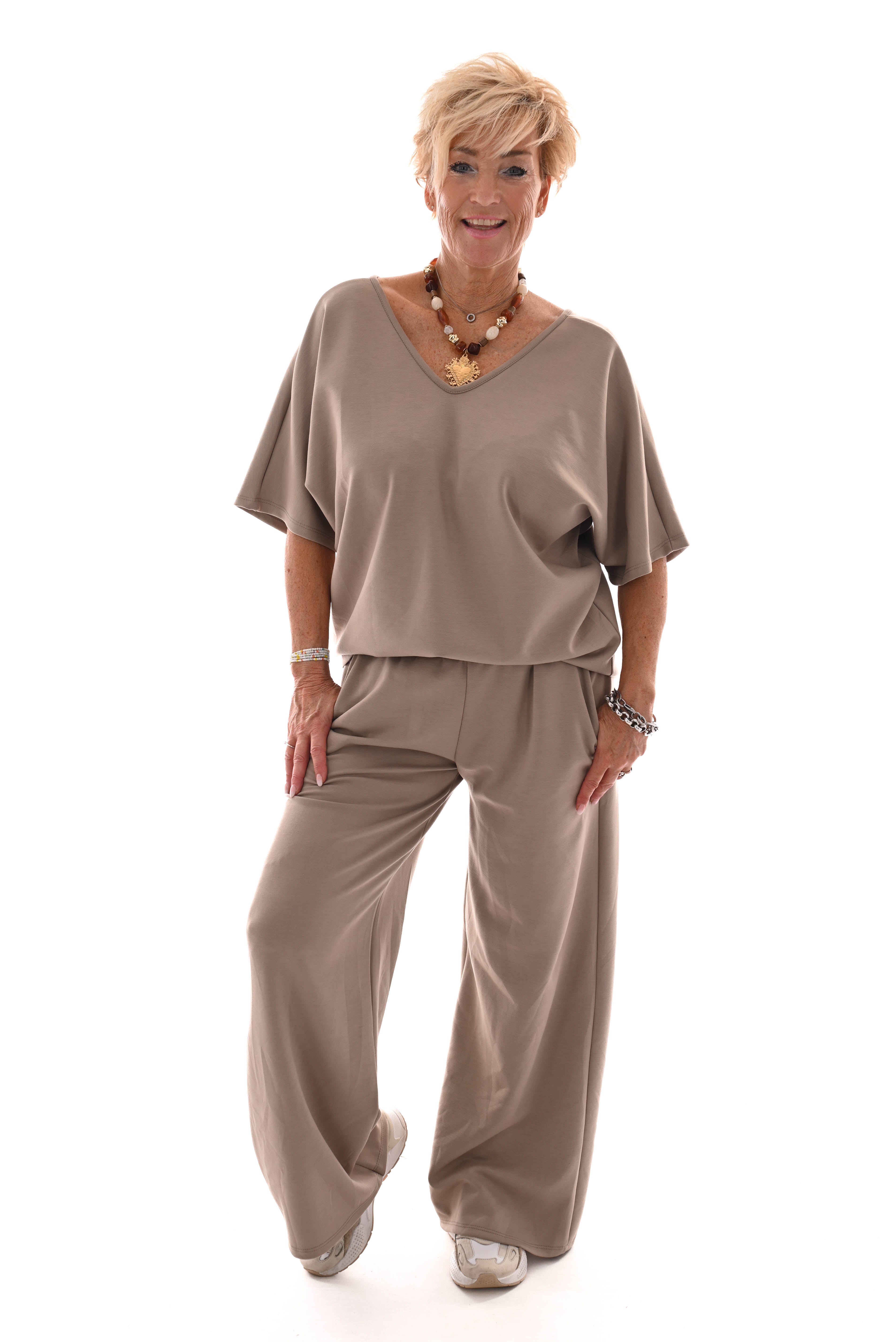 Tweedelig pak top met strik rug uni beige