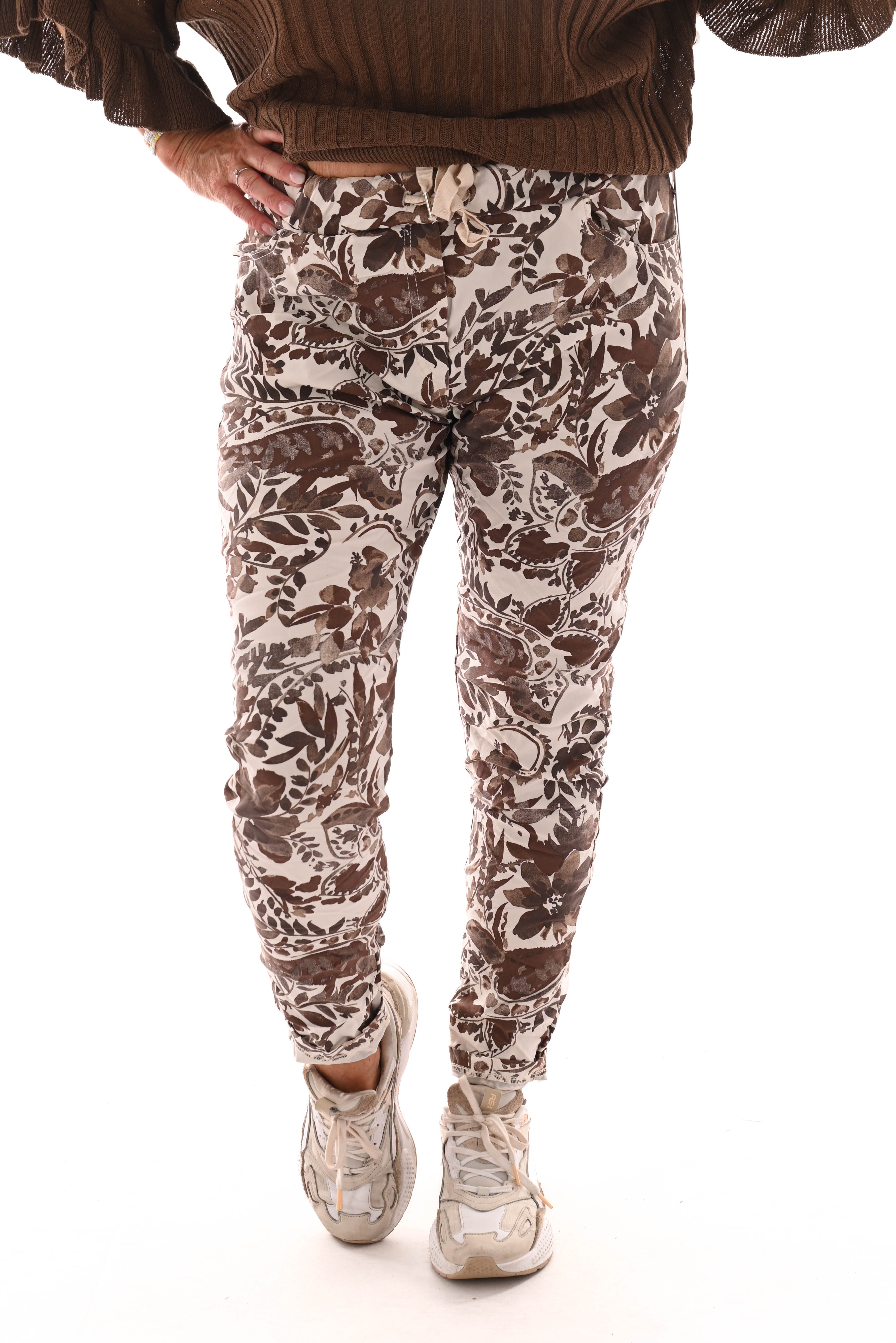 Stretchbroek bloemenprint beige