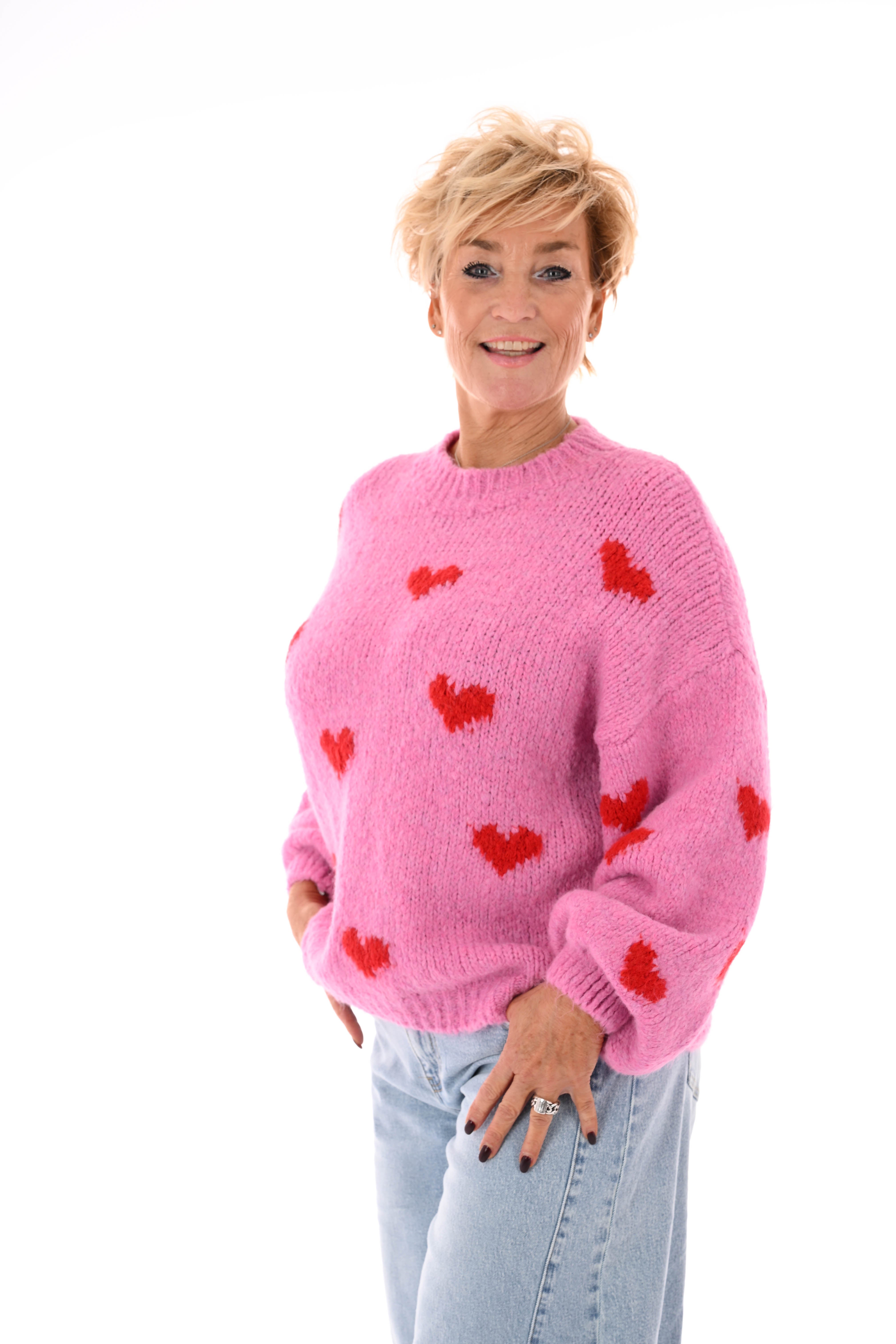 Gebreide trui kleine hartjes roze