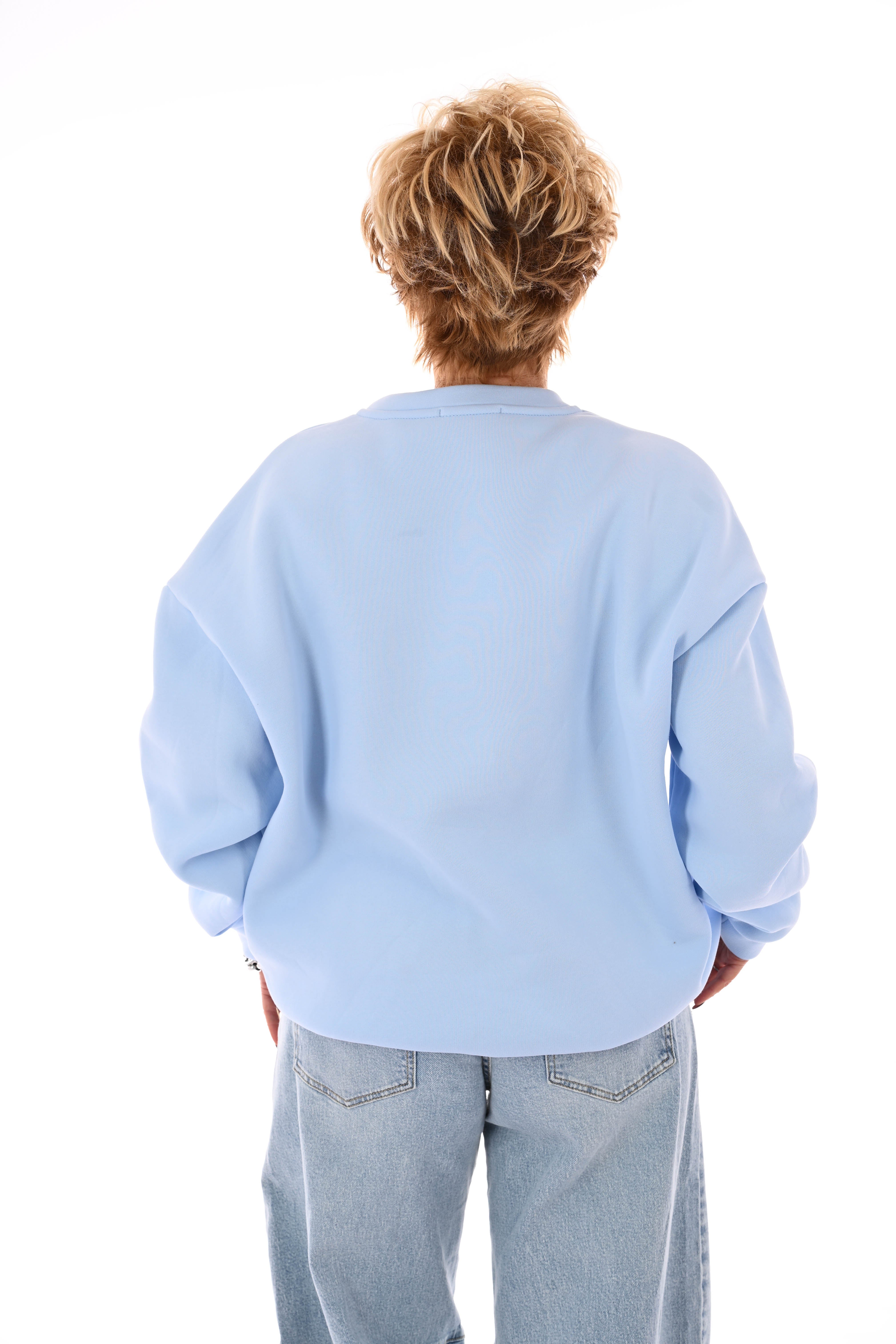 Sweater apres skiclub lichtblauw