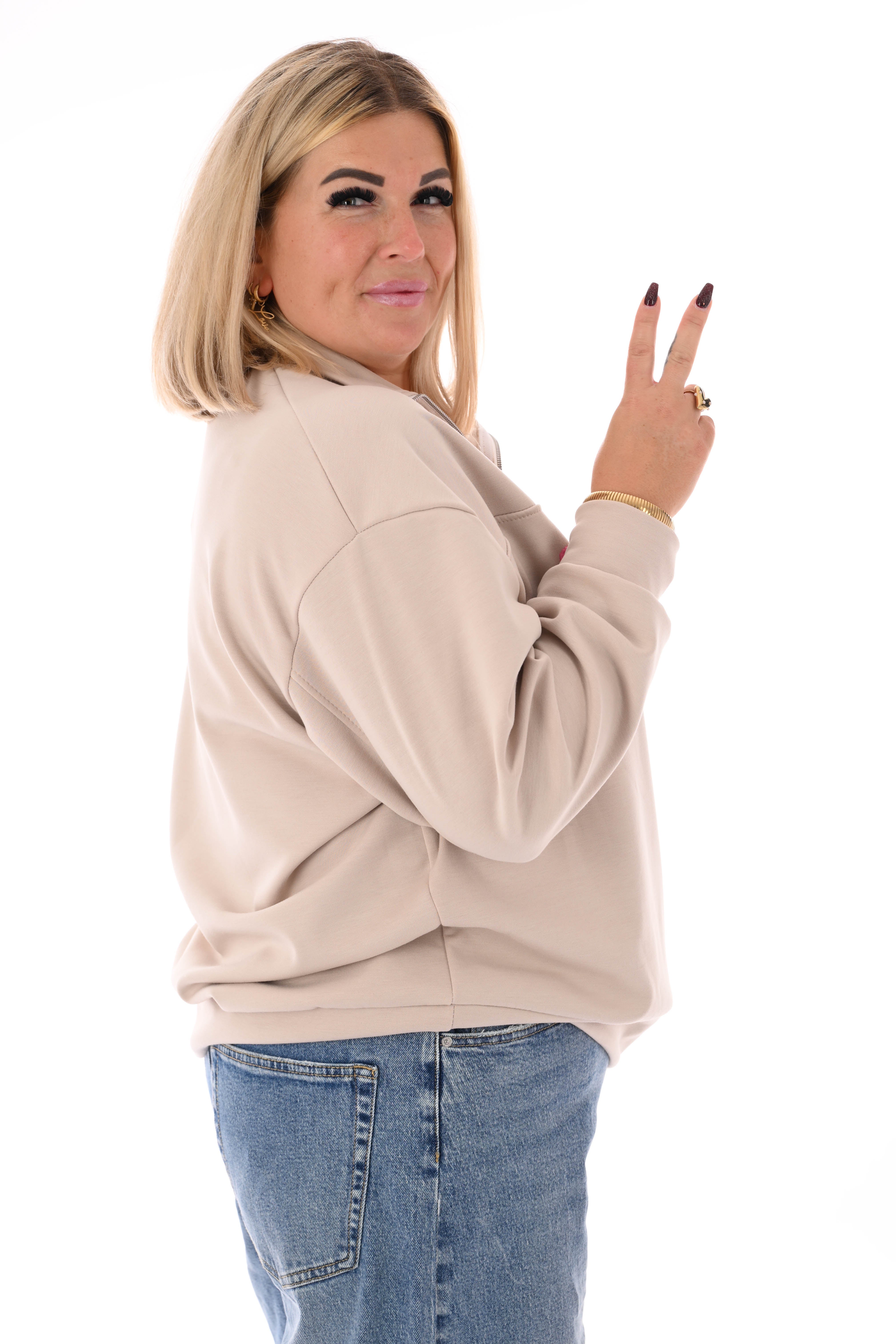 Sweater new york met rits beige