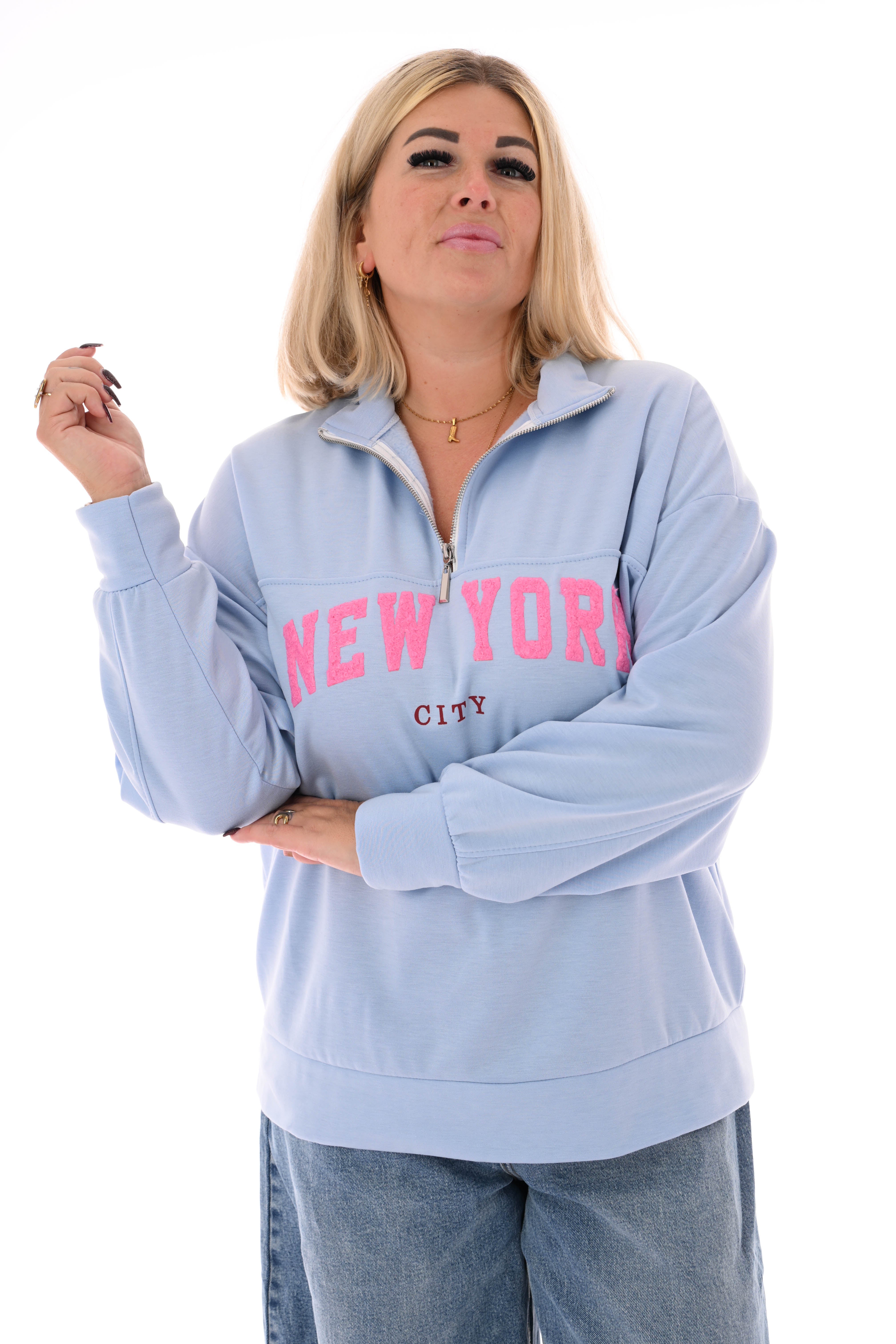Sweater new york met rits lichtblauw