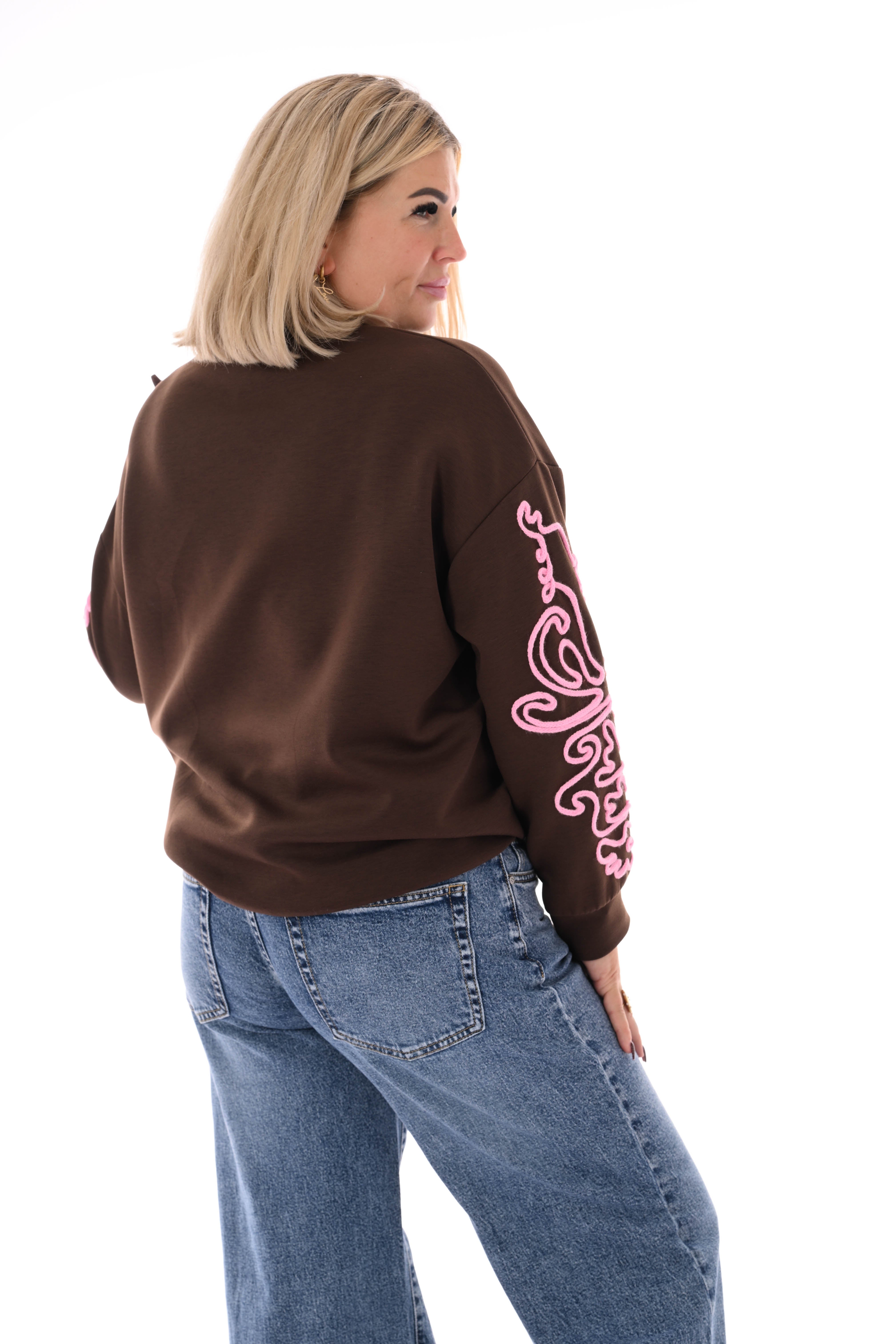 Sweater mouwen met borduursels bruin