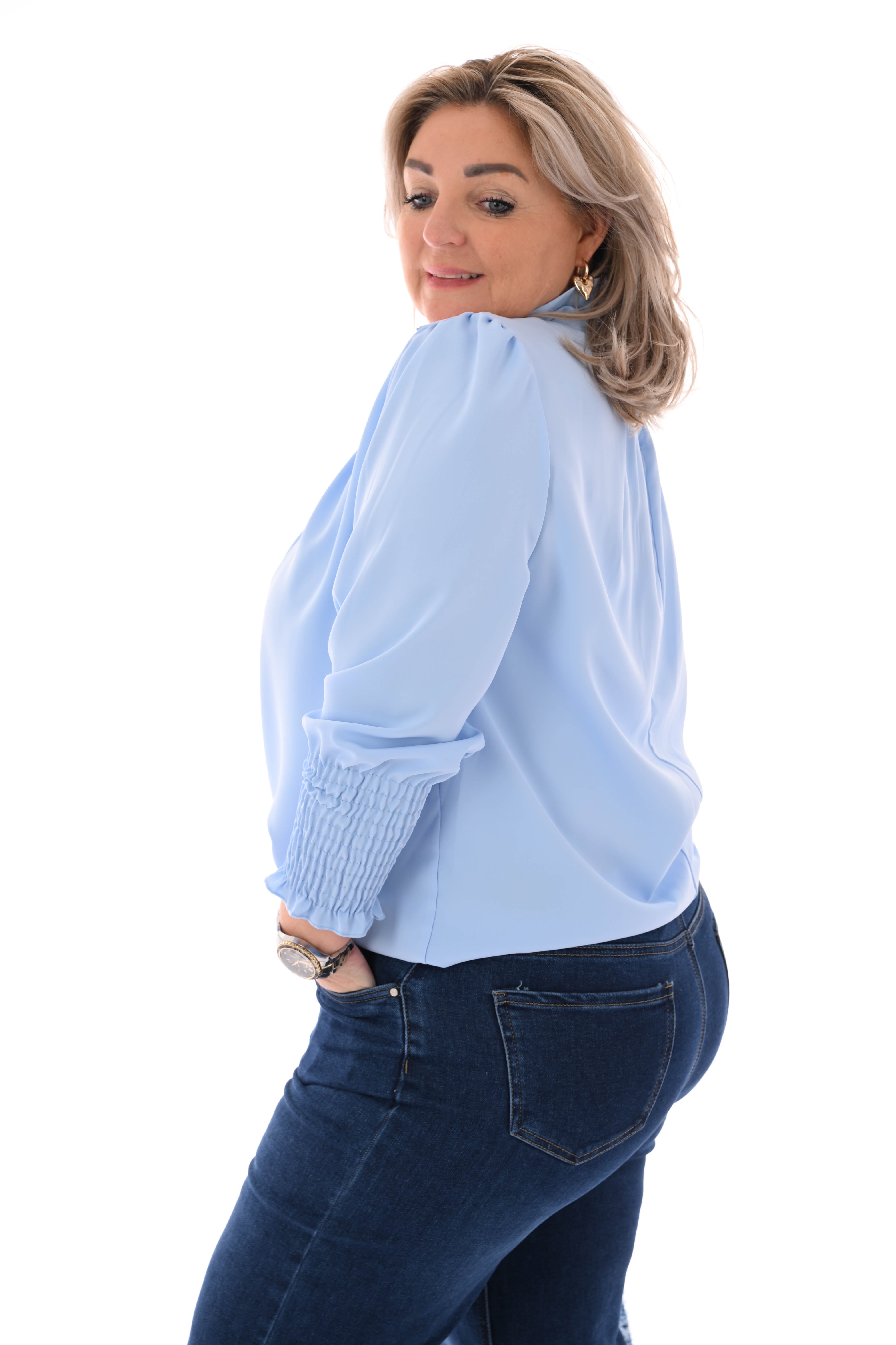 Blouse turtle neck smock mouwen lichtblauw