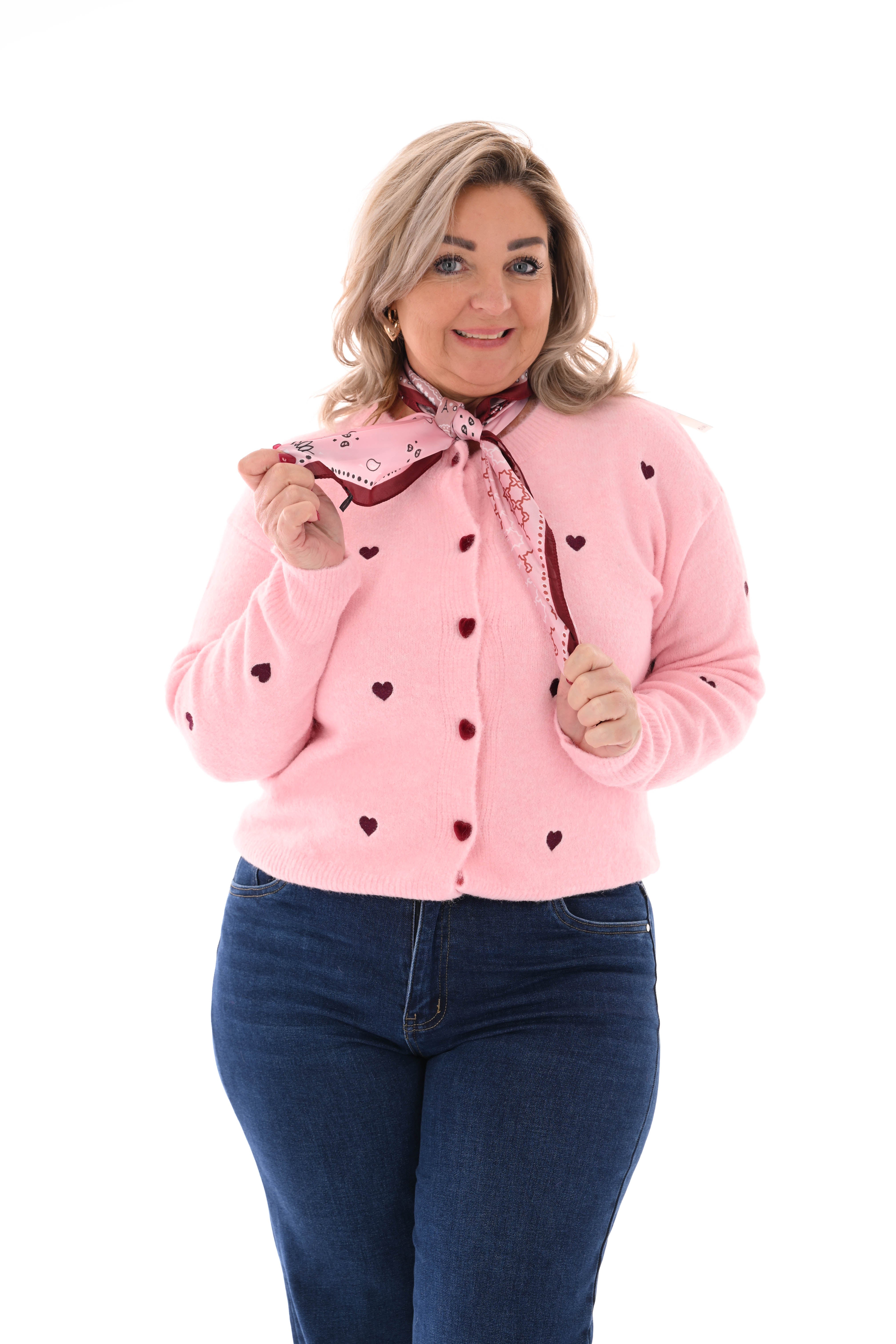 Fijn gebreid vest met hartjes roze