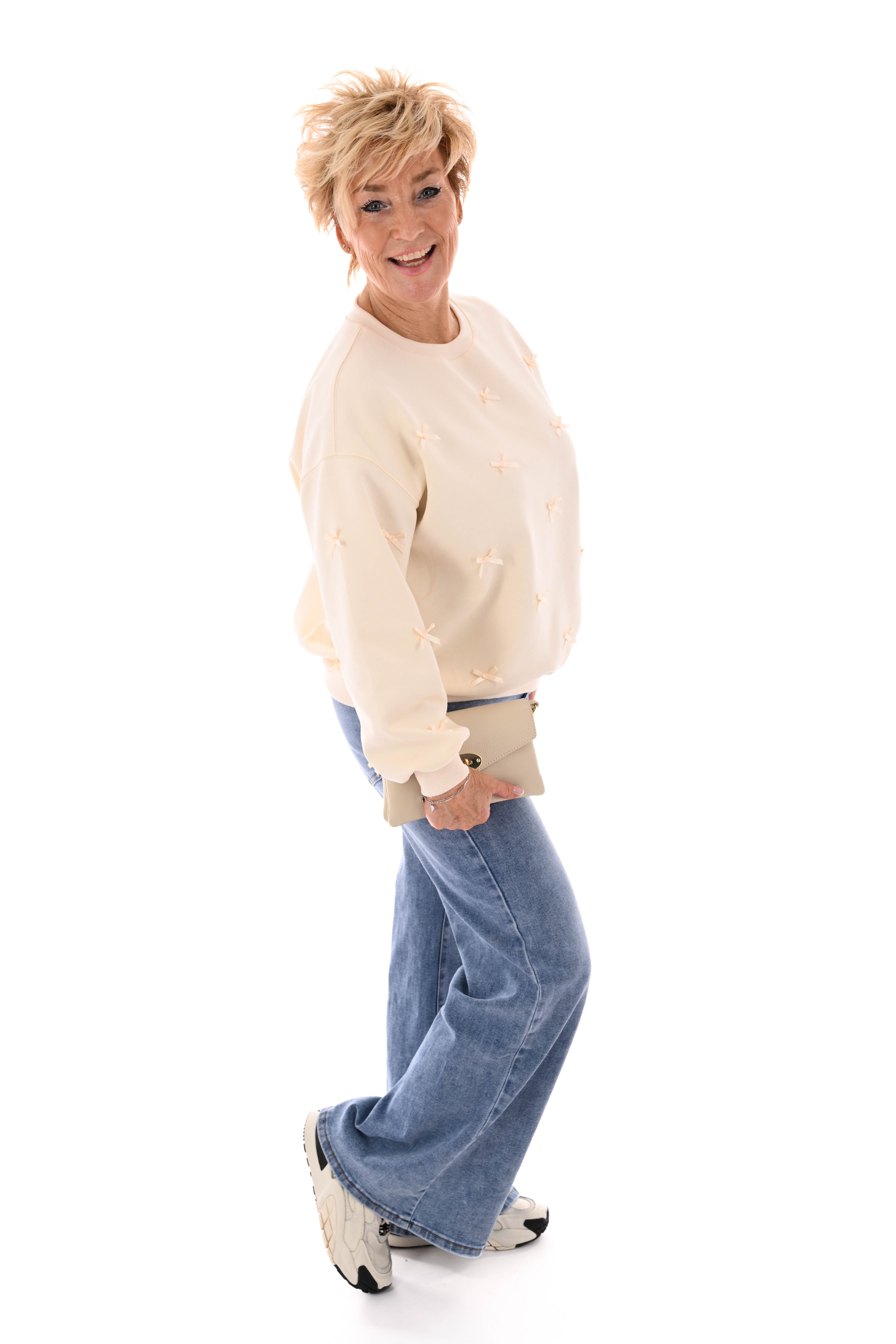 Sweater strikjes creme