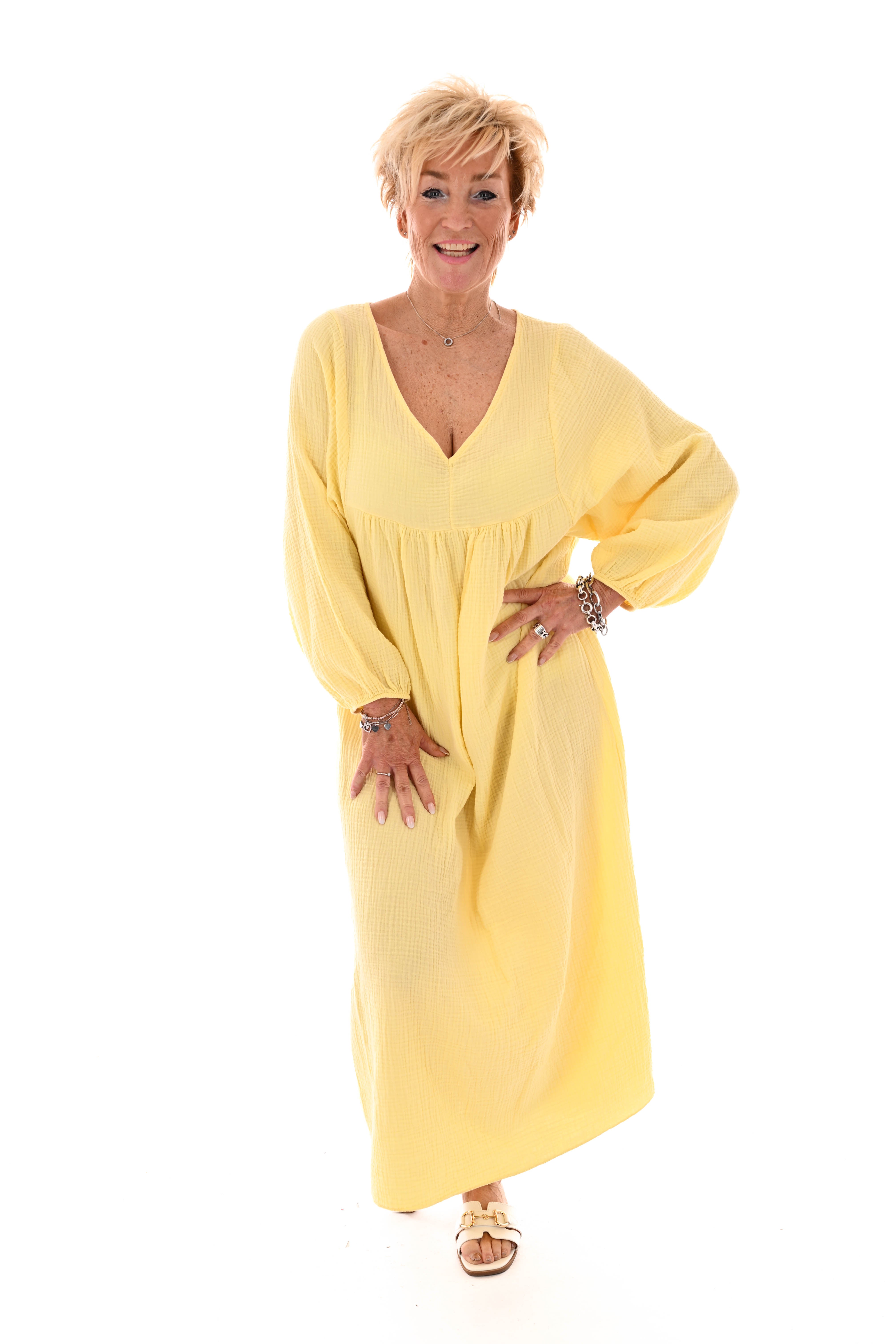 Lange wafel jurk v-hals en pofmouwen lichtgeel