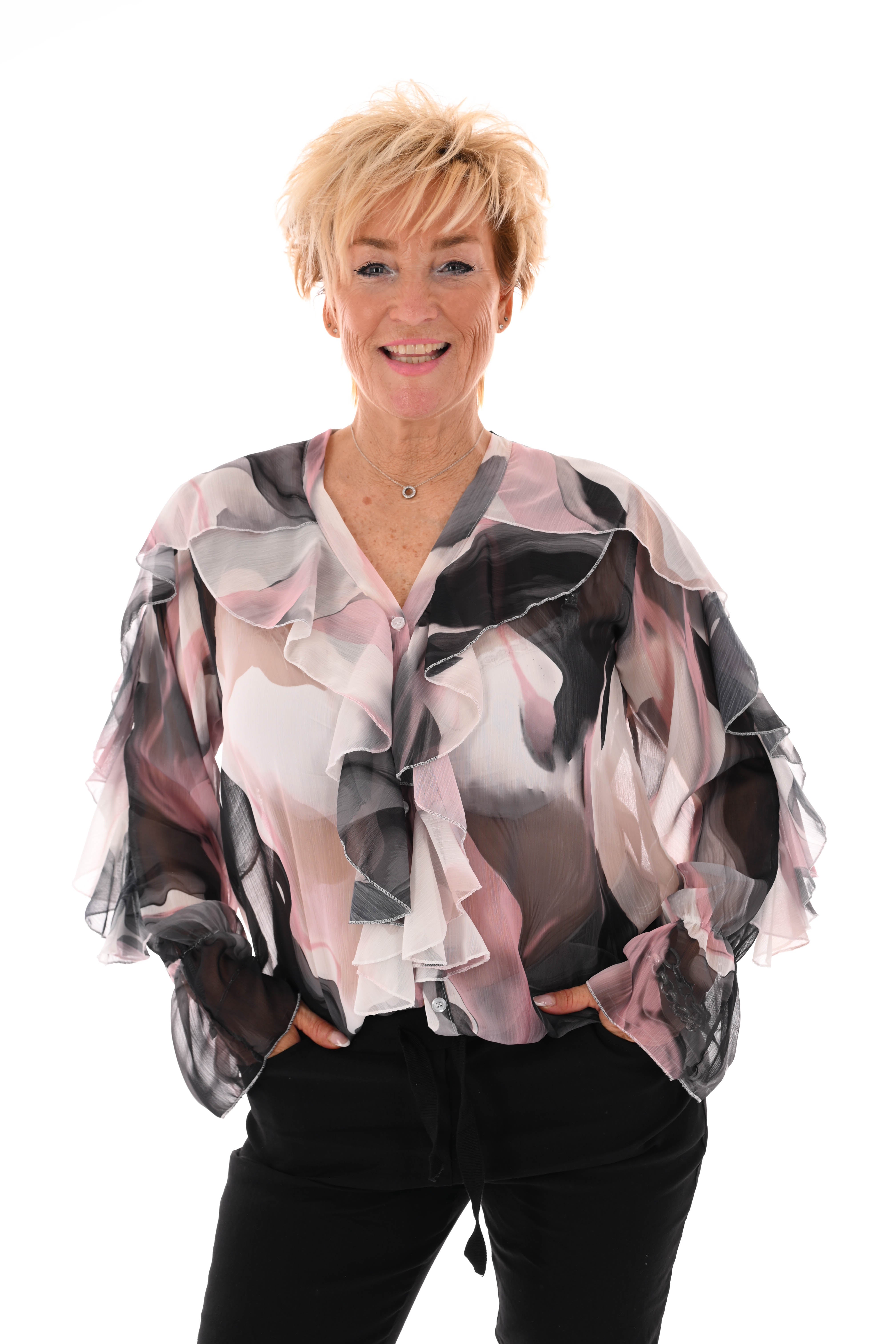 Blouse roezels met trompetmouwen abstract zwart/roze
