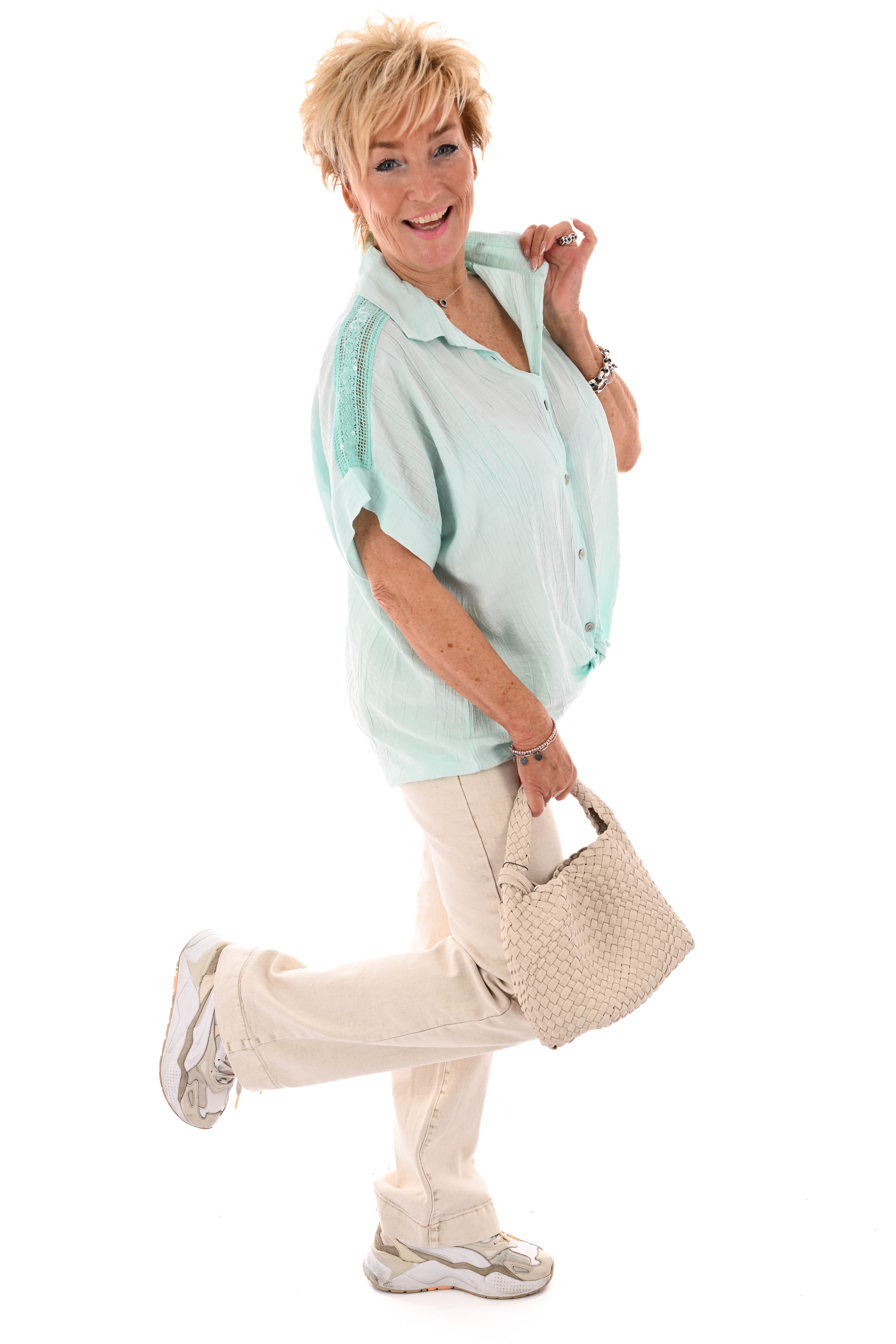 Blouse korte mouwen pailletten details turquoise