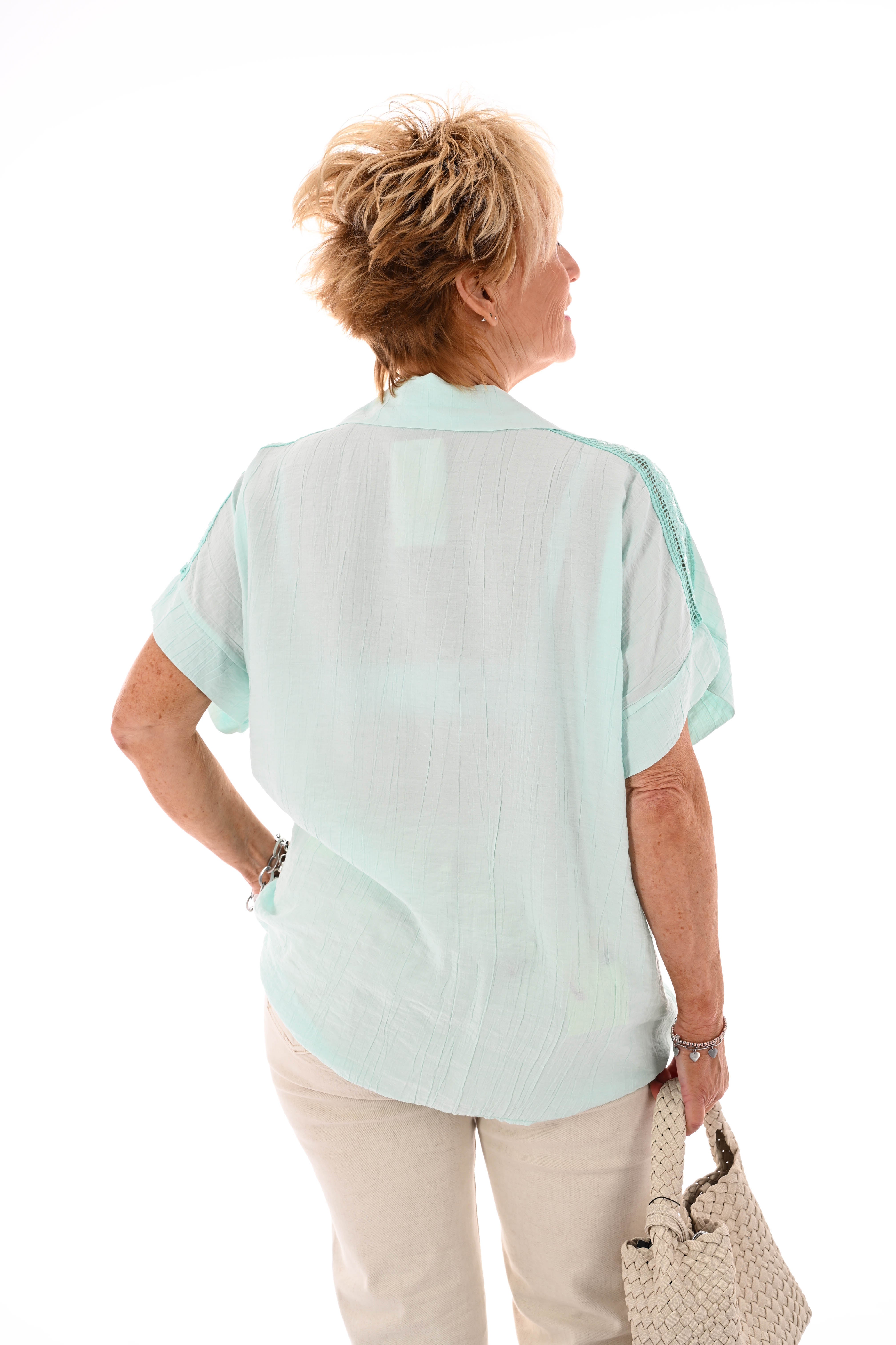 Blouse korte mouwen pailletten details turquoise