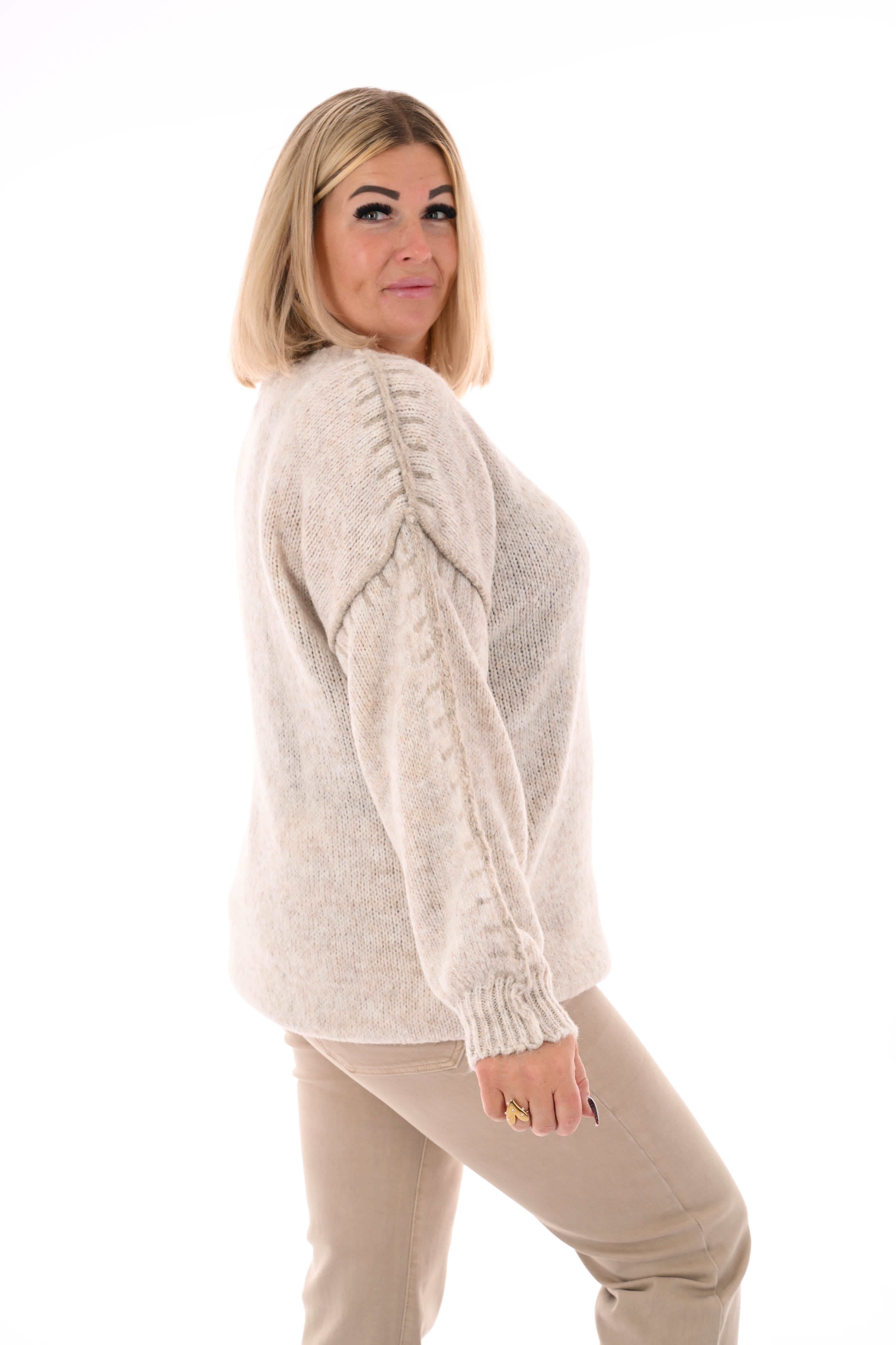 Gebreide trui met naaddetail beige