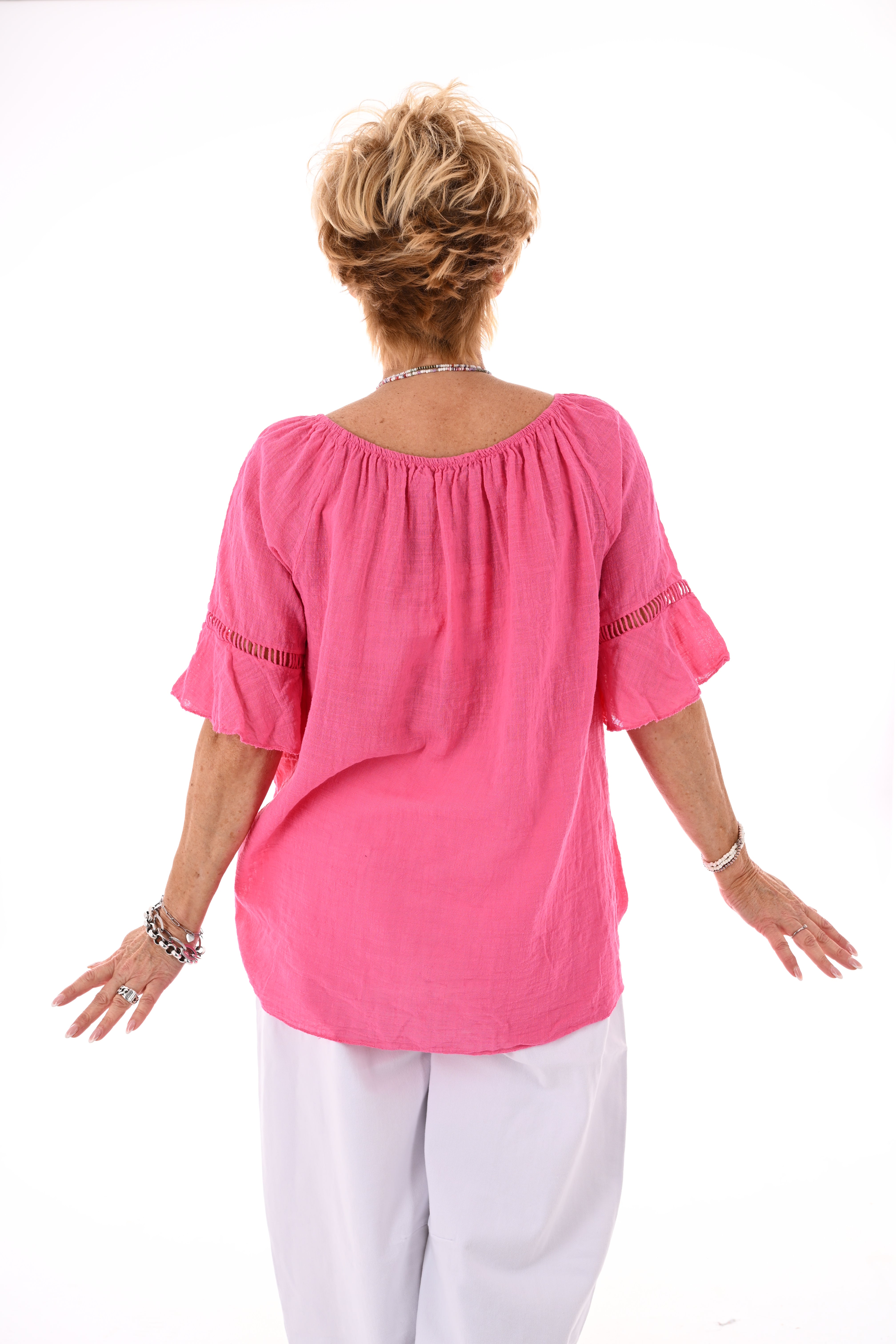 Top ibiza met kwastjes fuchsia